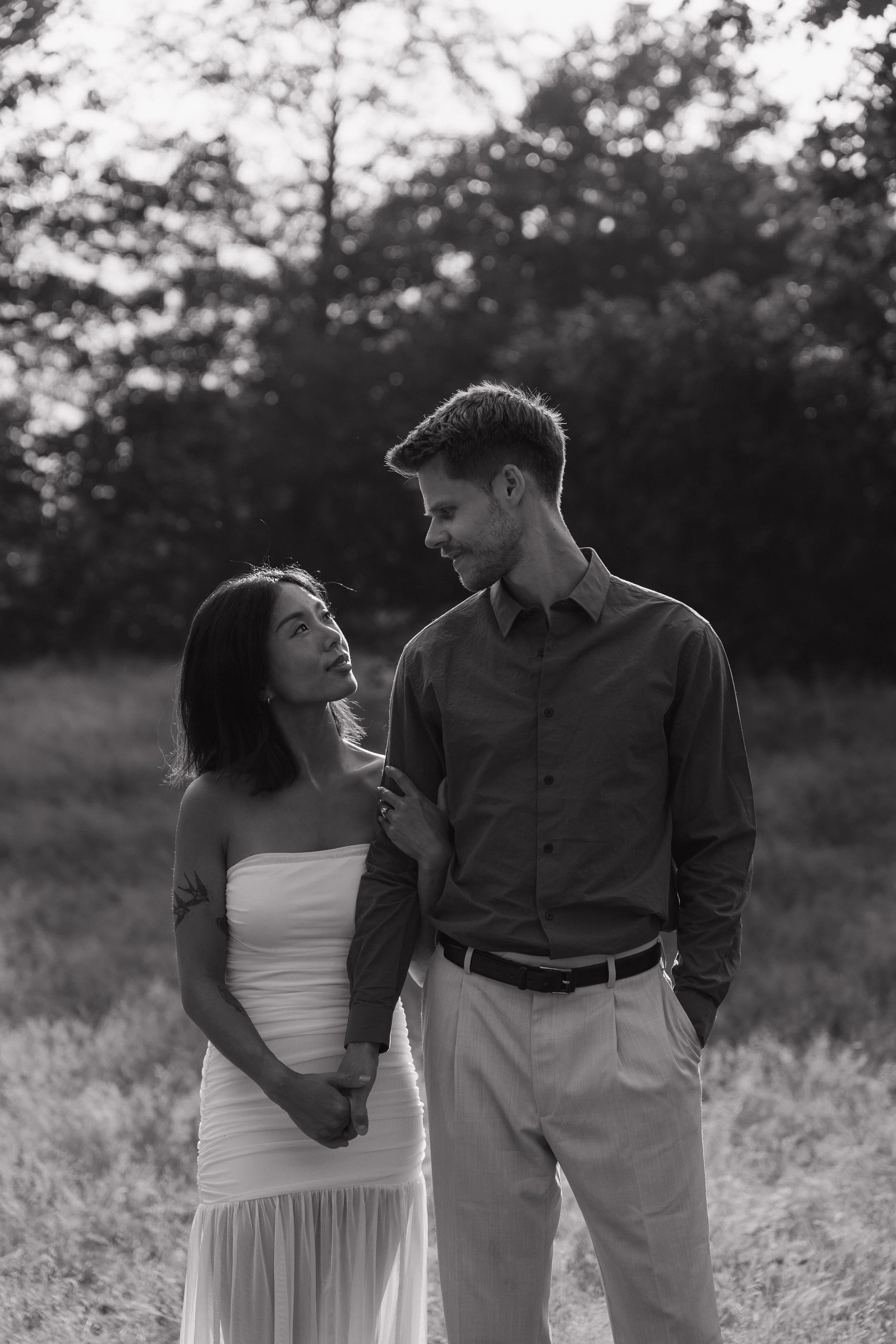 couples golden hour engagement session in the mountains and a field in Squamish BC