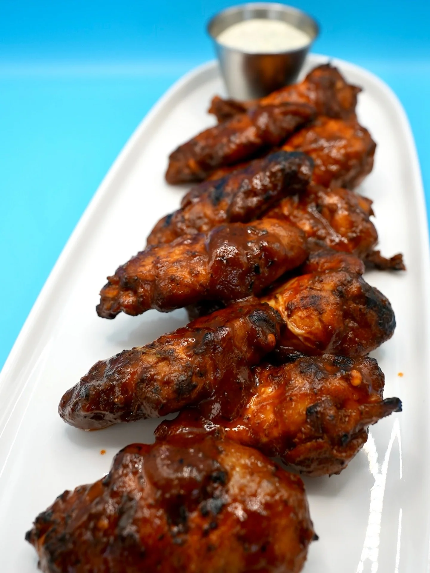 Get ready for our Smoked Wings, tossed in BBQ, Buffalo, or our special Daytona sauce

or try them Naked

they're so amazingly delicious, sauce is optional