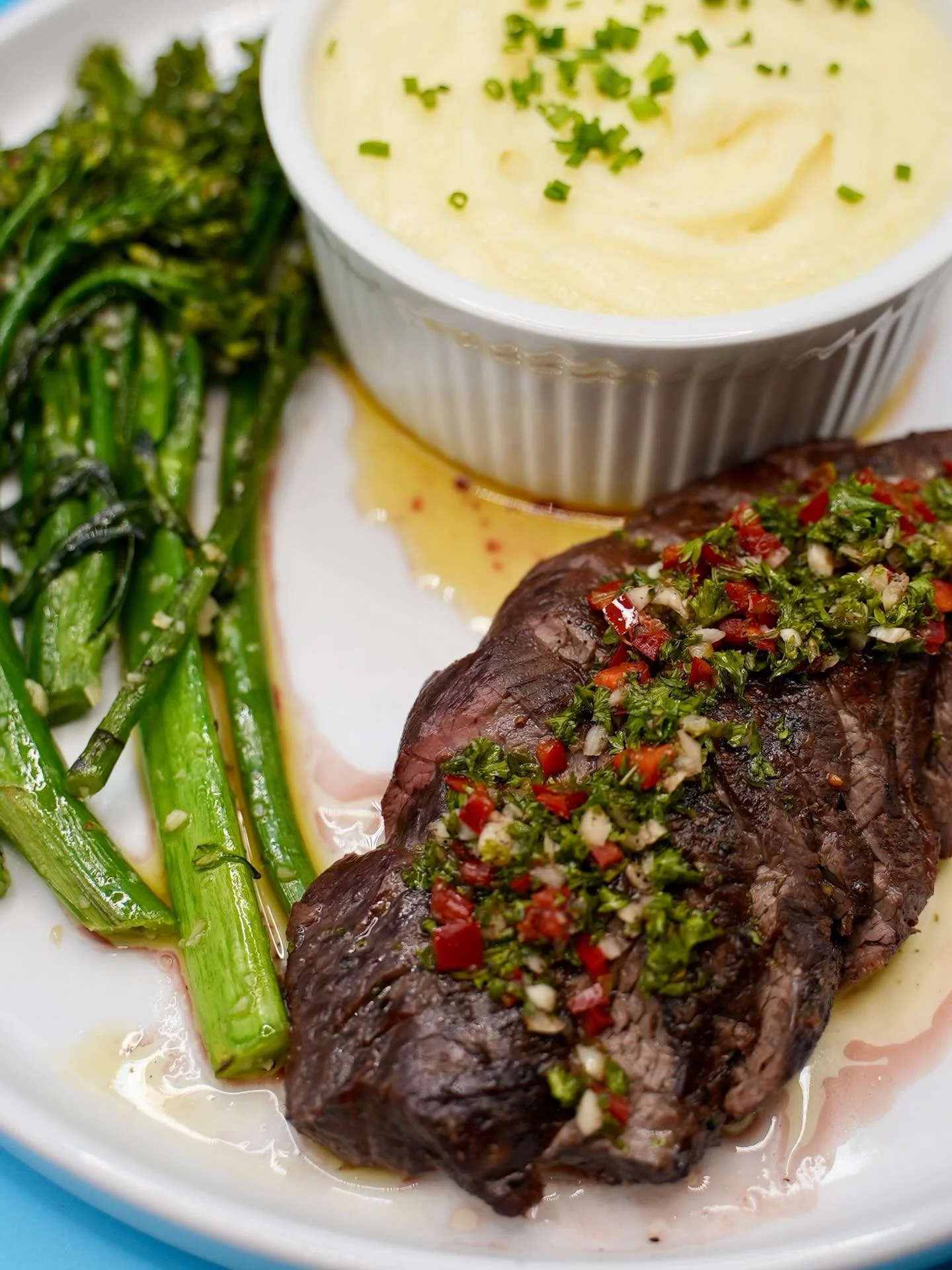Hanger Steak

8oz Hanger topped with Chimichurri, Grilled Broccolini, Classic Mashed Potatoes