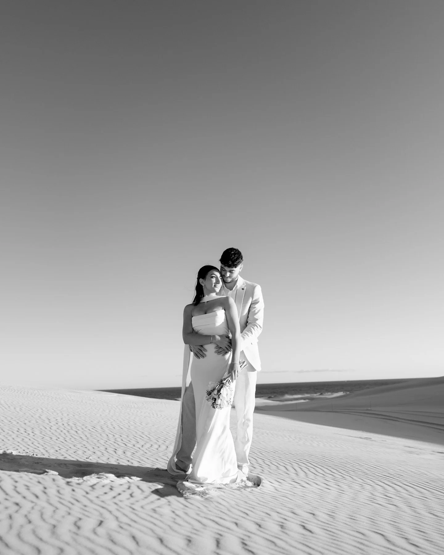 ivory dunes, sea salt in the air &amp; quiet grace 🤍
sydney pre-wedding &bull; stockton sand dunes, anna bay

mua @narmeenyaqubmakeup 
blooms @_littleprinceflowershop