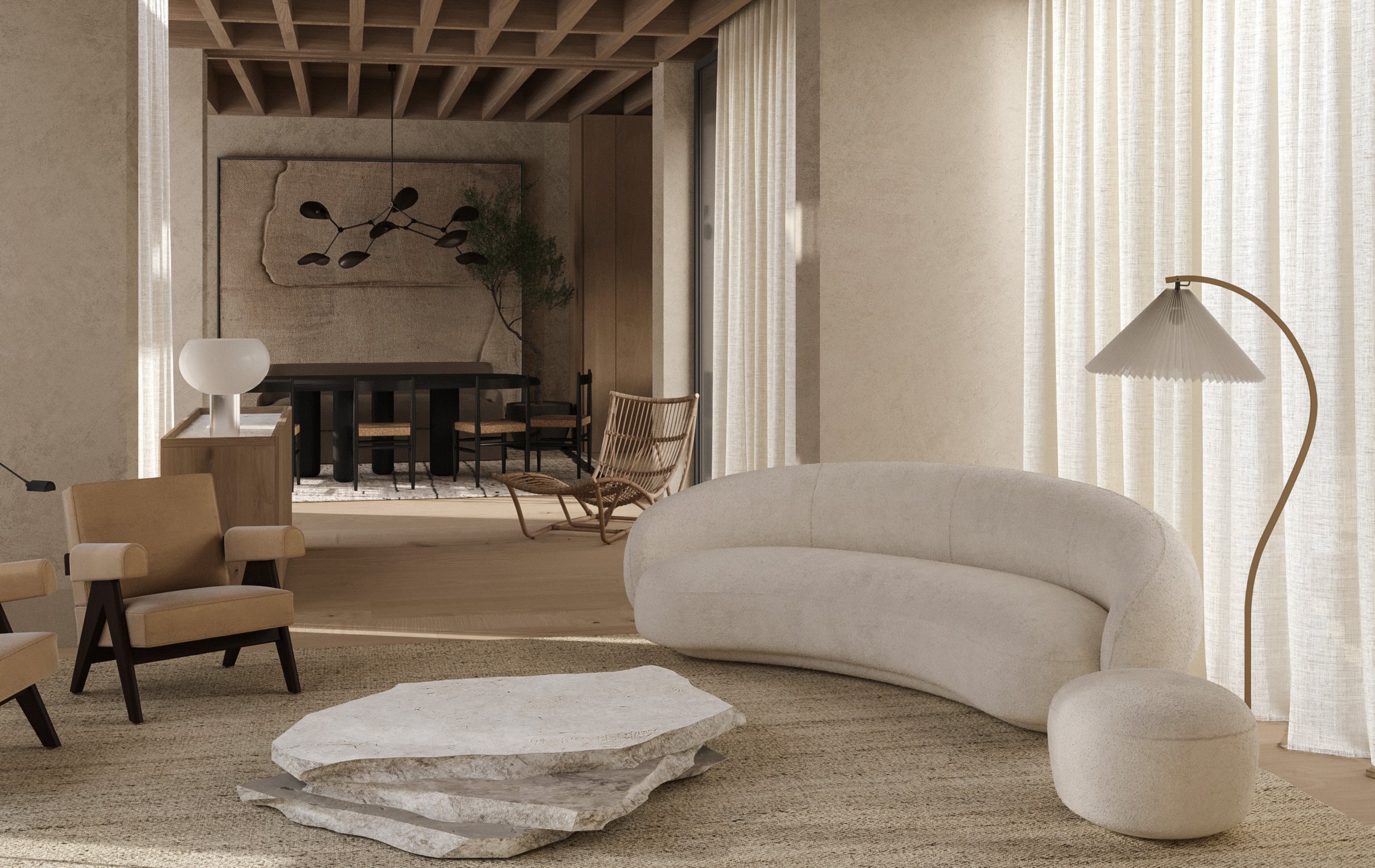 contemporary beach house living room with curved sofa travertine coffe table and Capitol Complex armchairs by Pierre Jeanneret interior design Troia Comporta