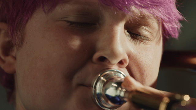 Trombone player playing the trombone