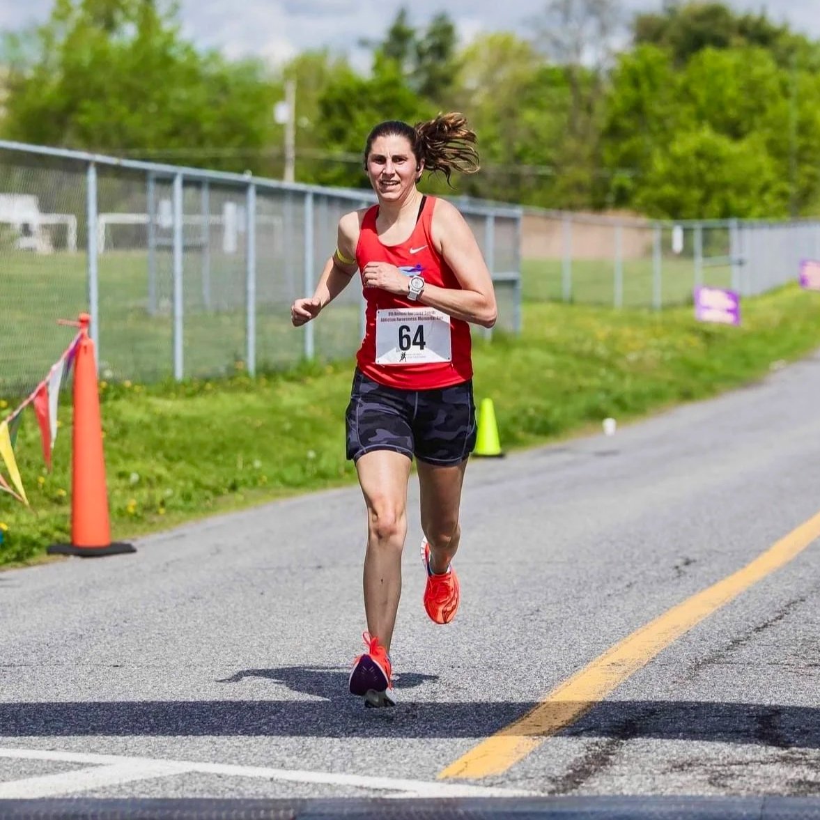 coach Jamie at the end of a 5k race in albany, New York.