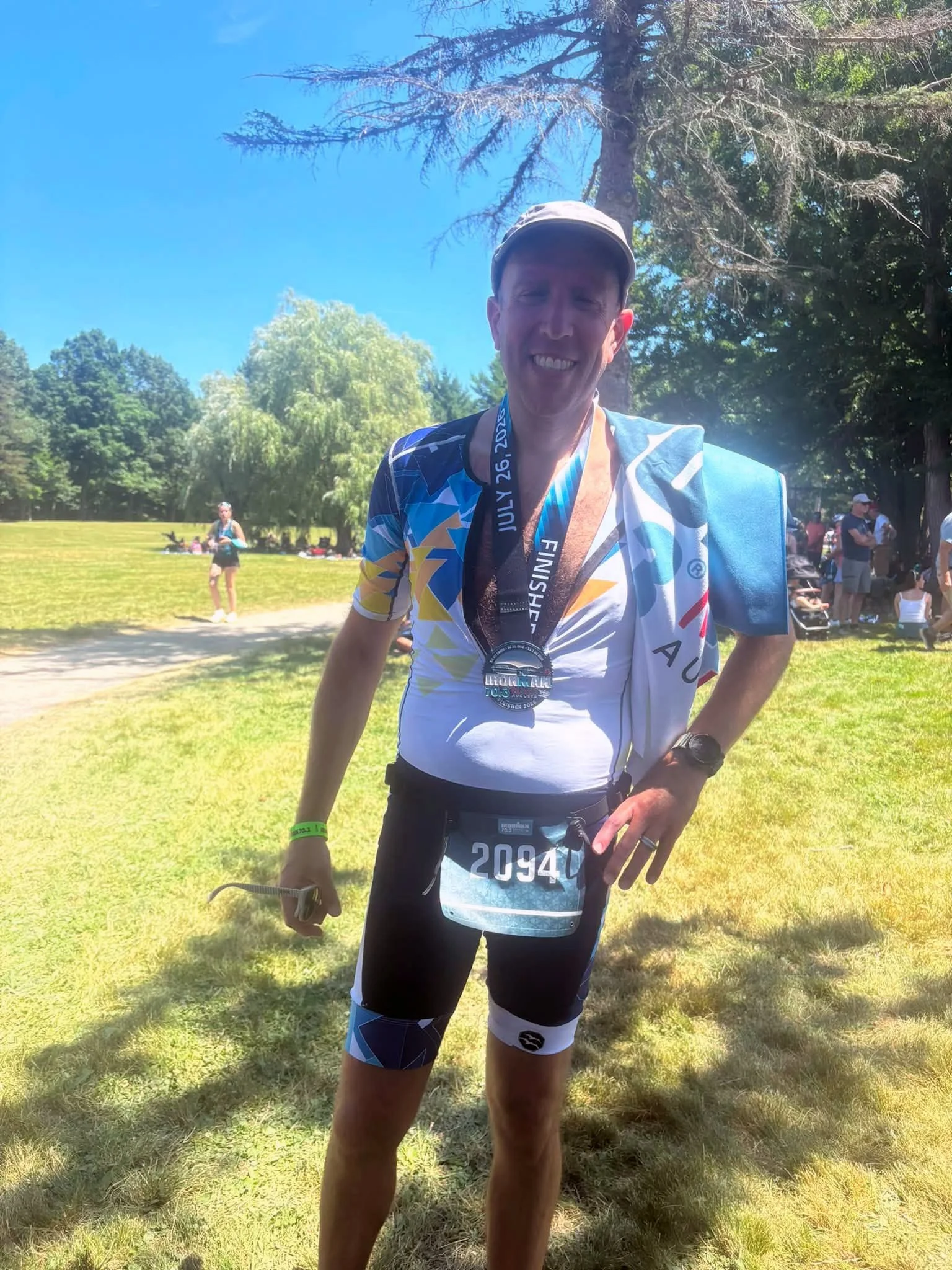 Empire State Endurance athlete celebrating an Ironman 70.3 finish