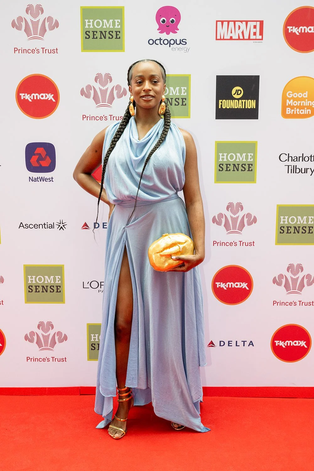 London’s trusted event photography specialist - DJ Cuppy arrives onto the red carpet at the King's Trust Awards ceremony.