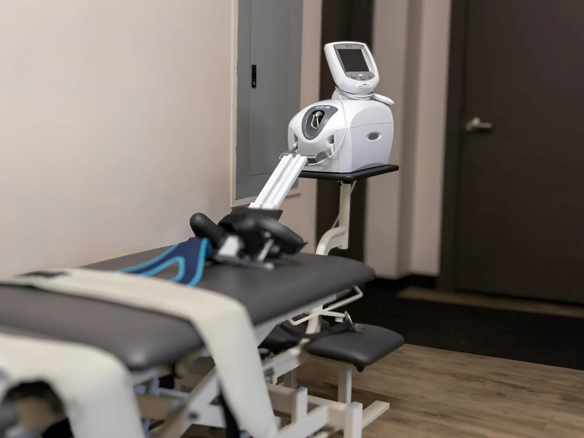 Spinal decompression machine for disc injuries from auto accidents at Axis Chiropractic and Massage West Valley City Utah