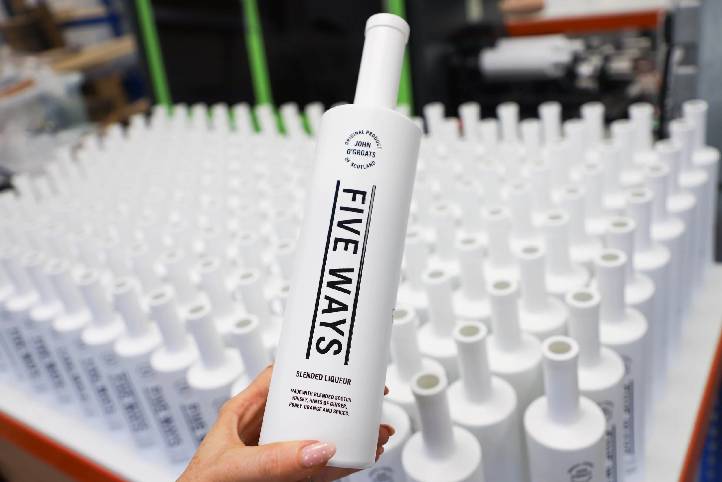 Printed black and white liqueur bottles