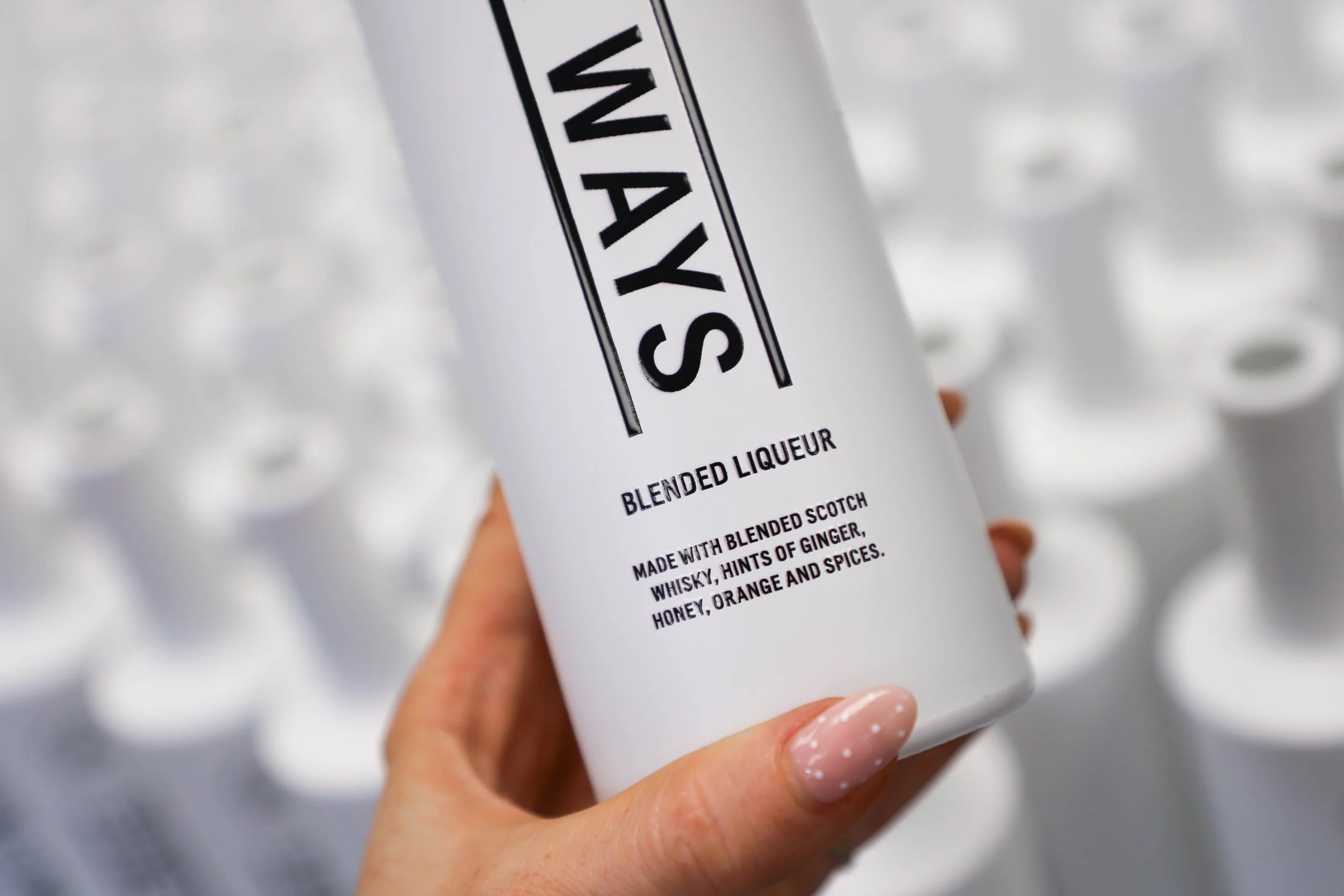 Printed black and white liqueur bottles