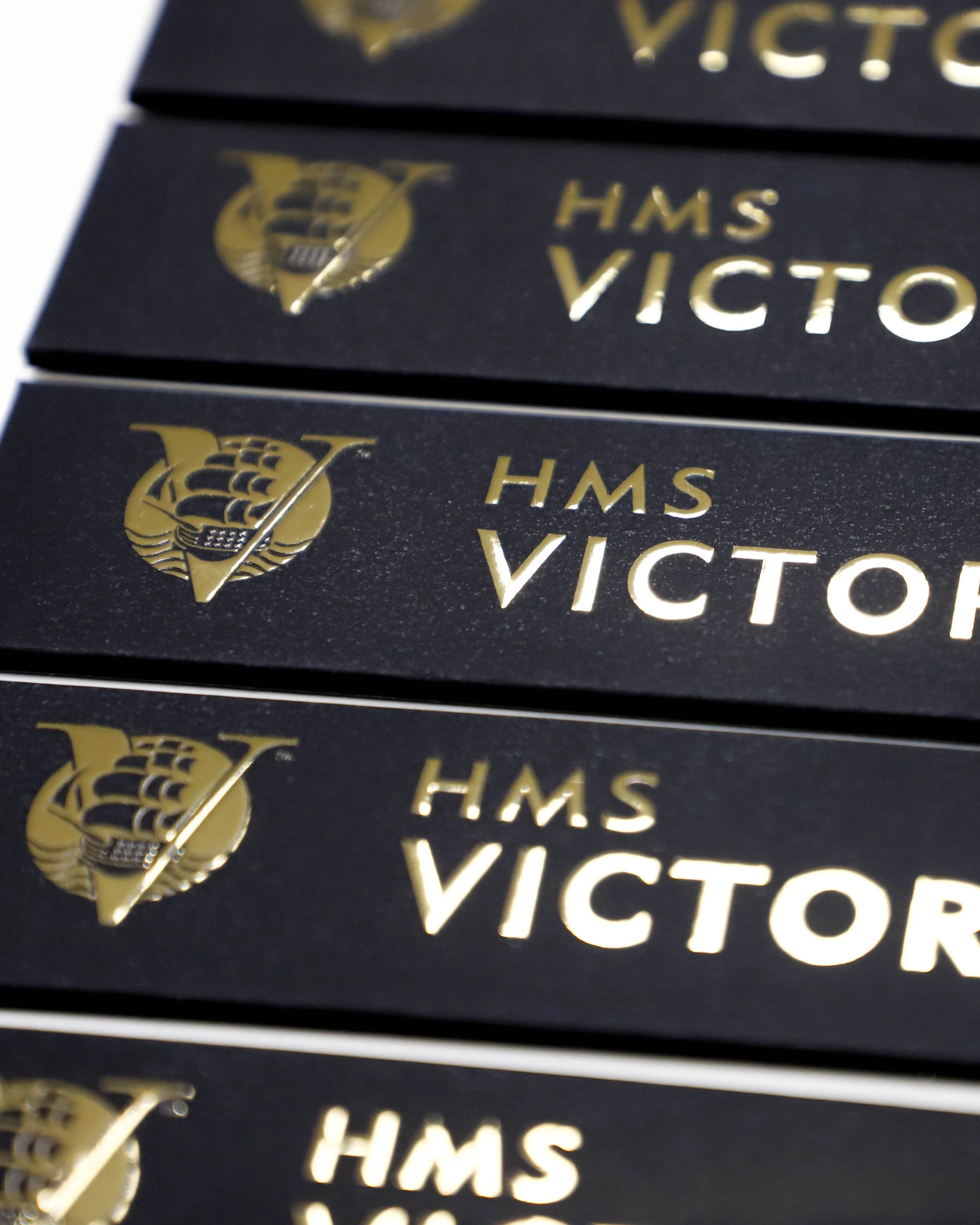 Black and gold foiled bookmarks