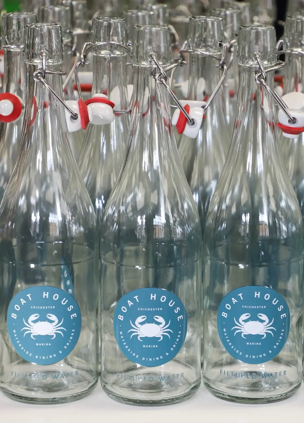 Printing on glass flip top bottles