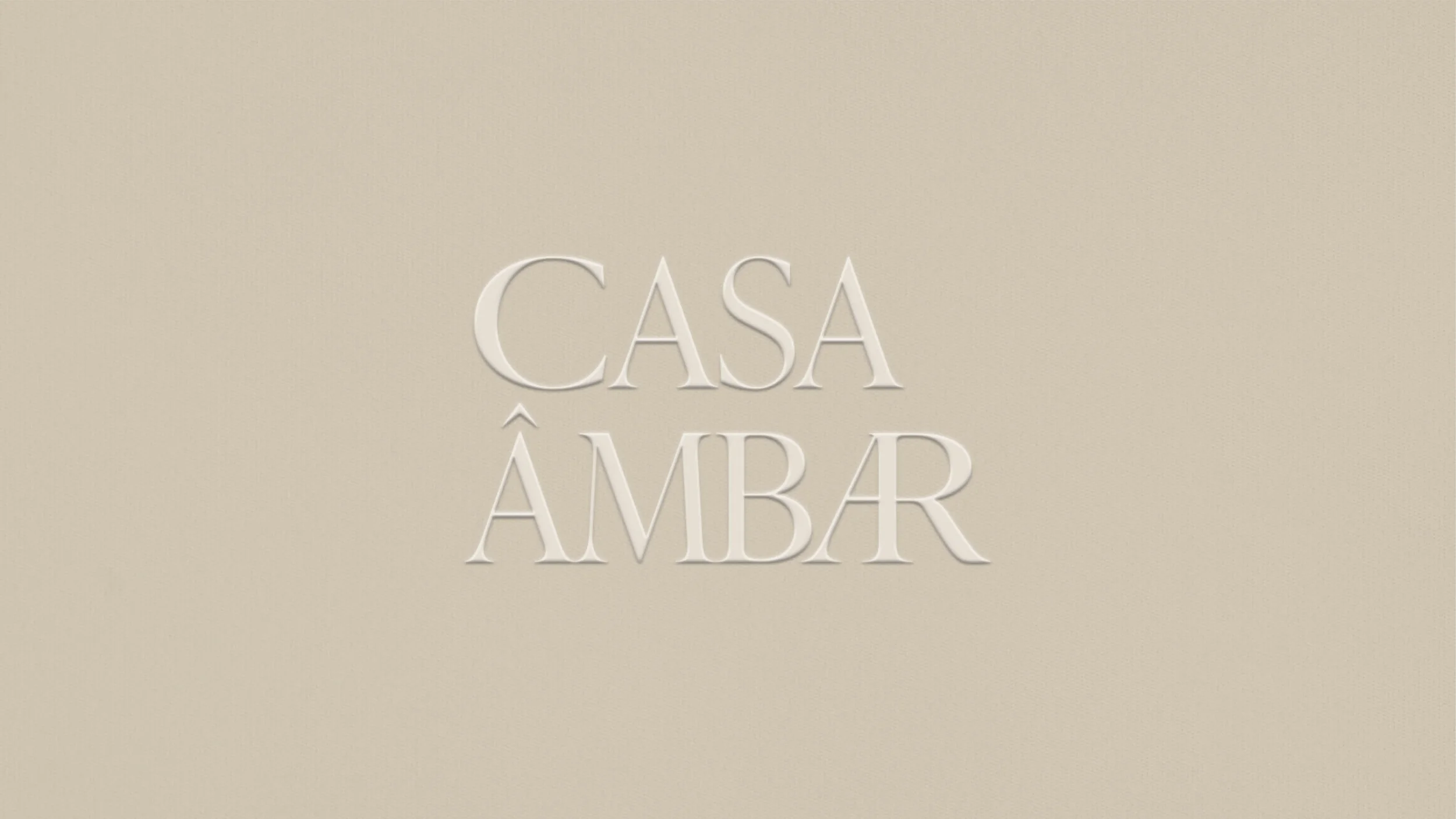 casa âmbar naming logo