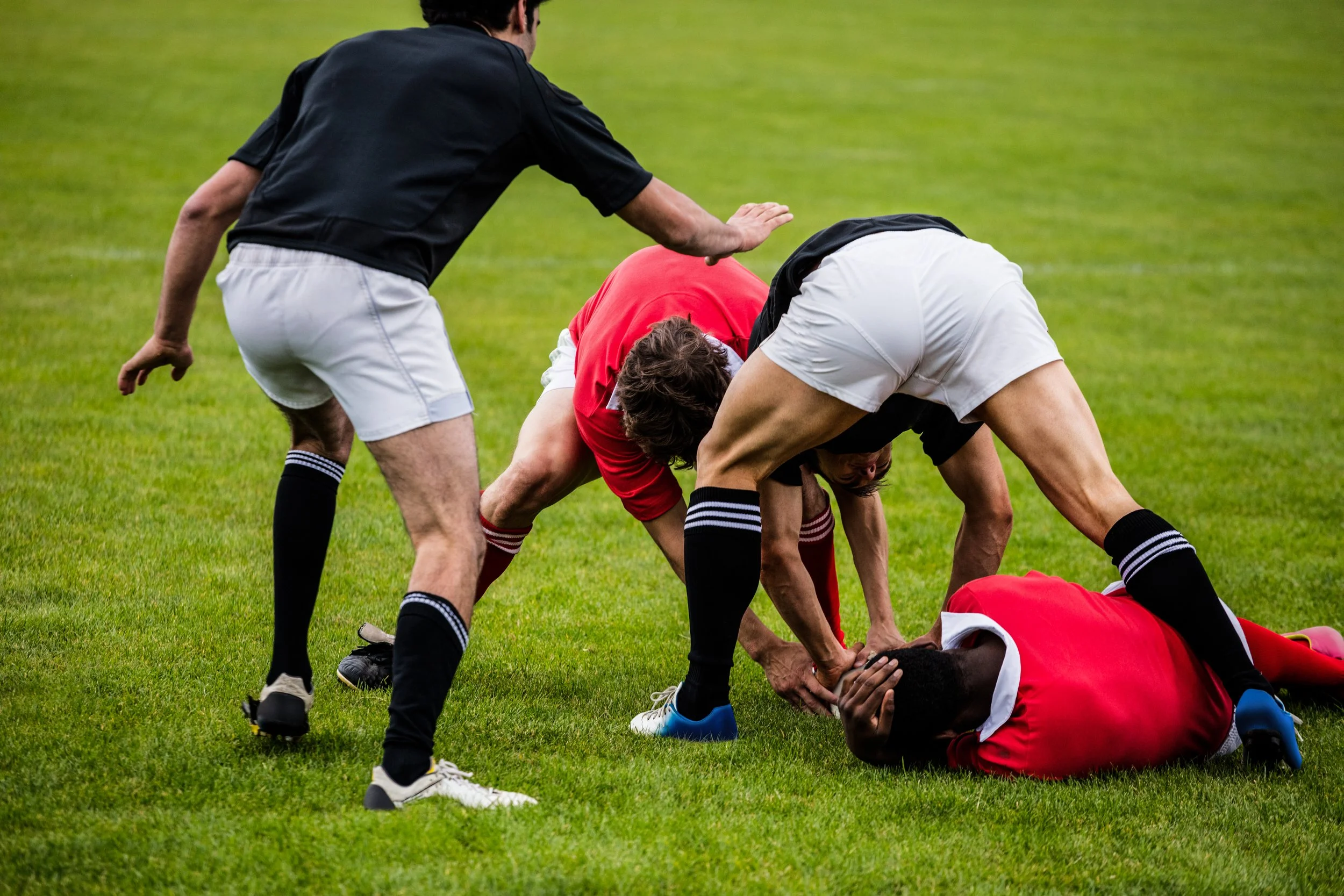 rugby-players-tackling-game.jpg