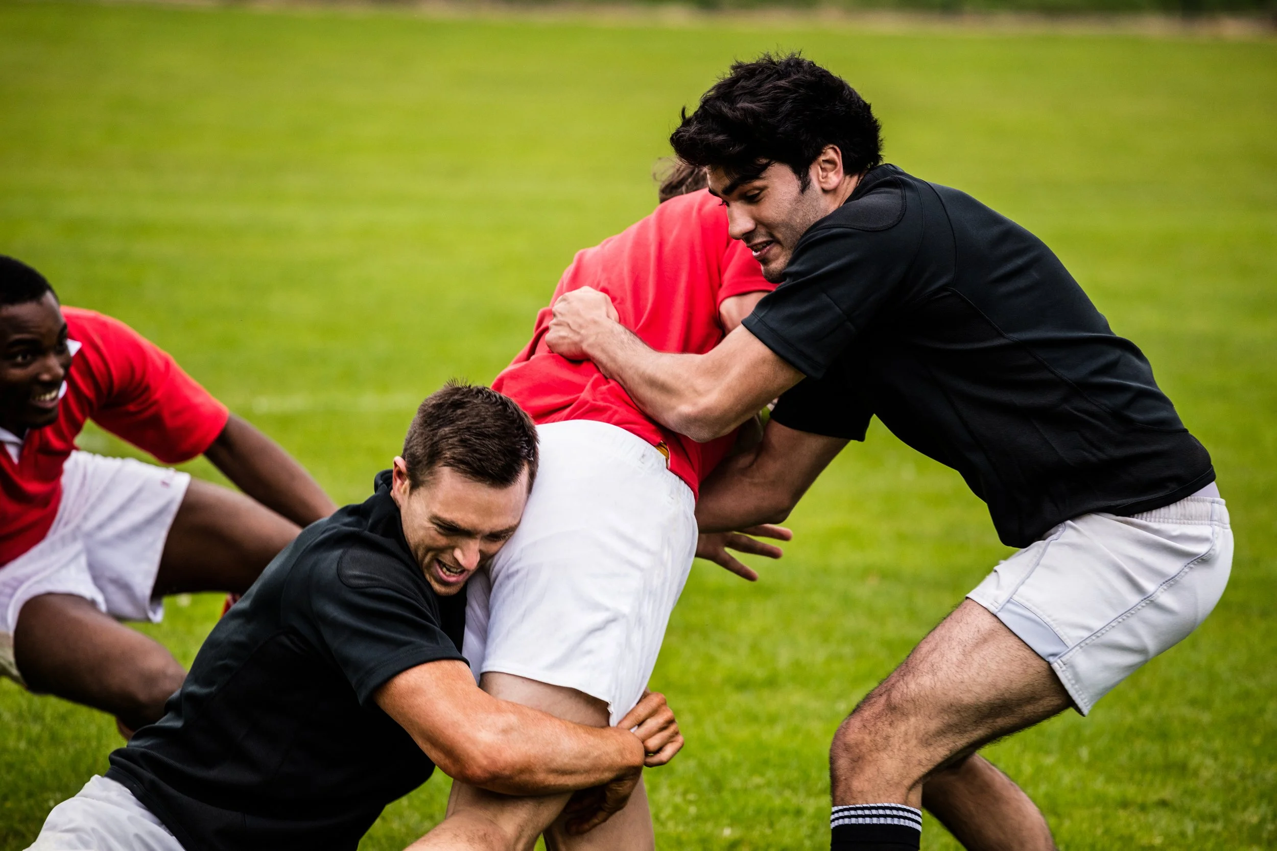 rugby-players-tackling-game (1).jpg
