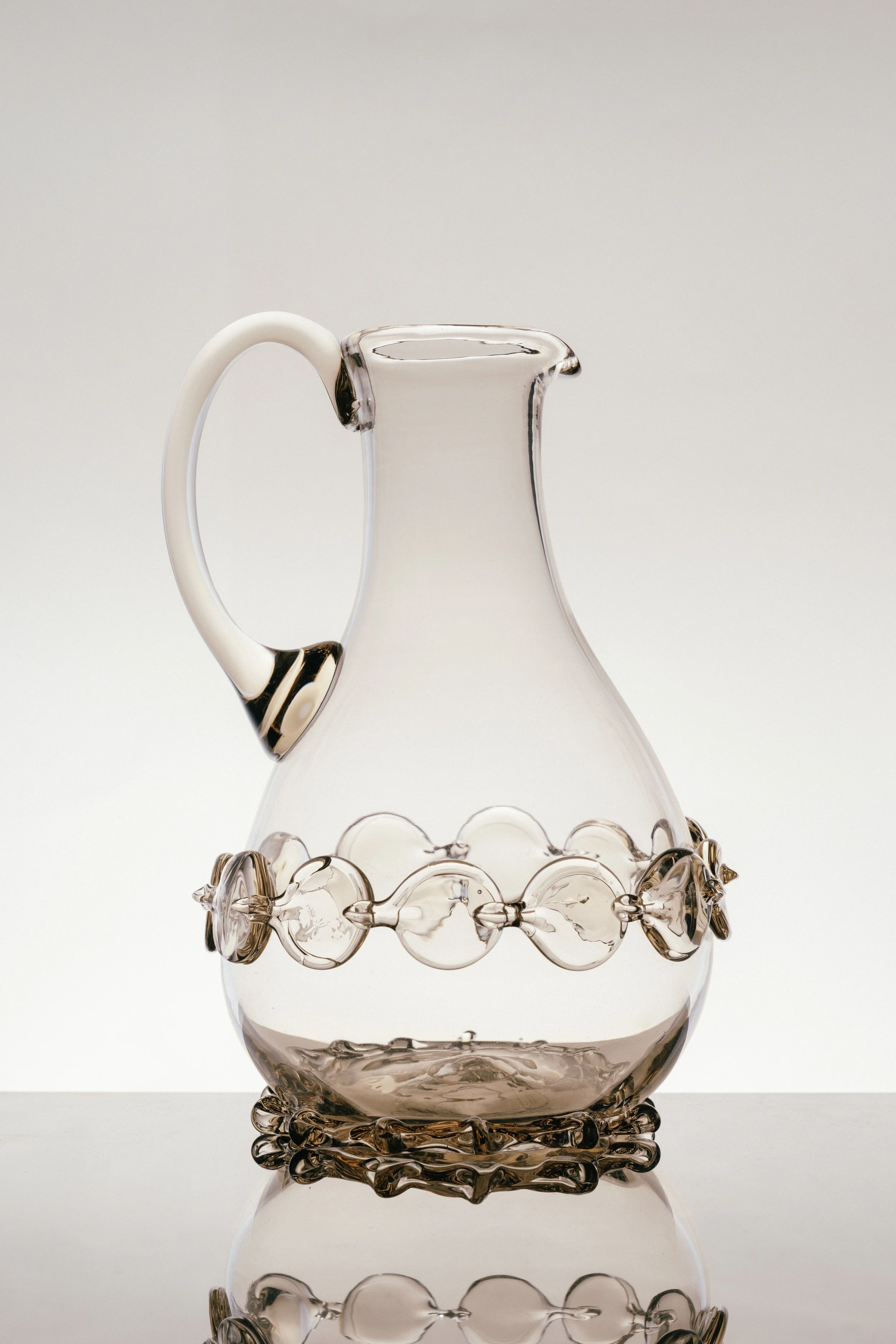 Mouthblown carafe with ornaments