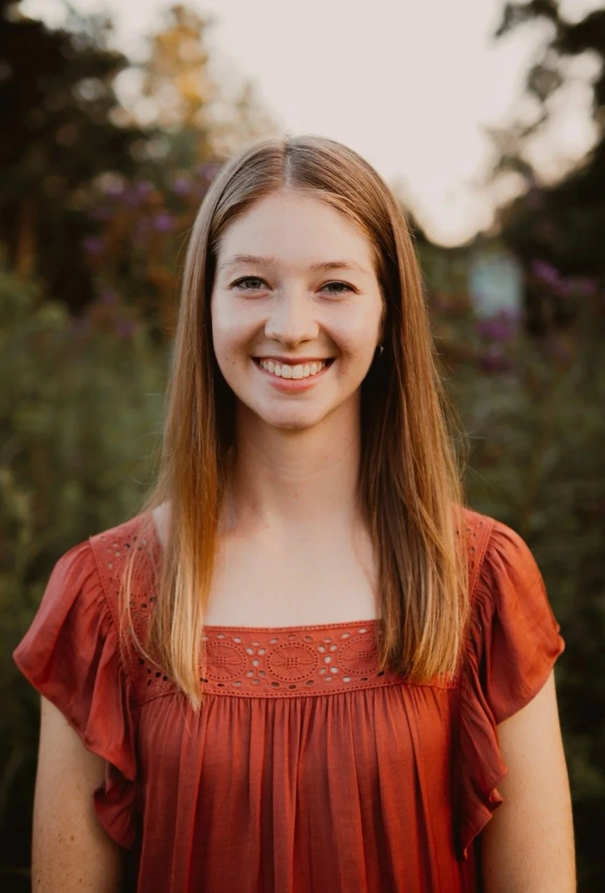 Graphic designer and small business branding specialist smiling