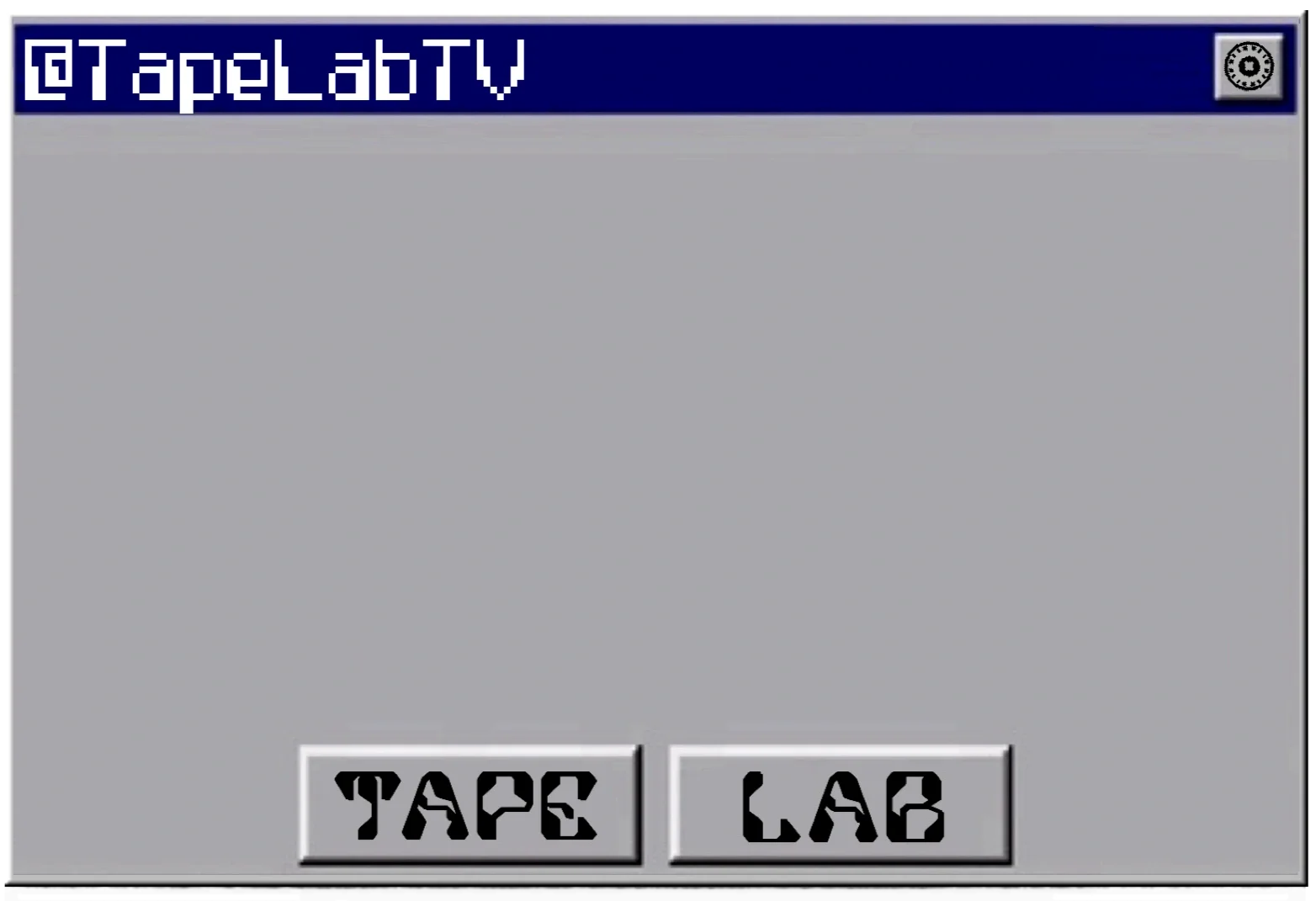 Screen of a digital interface with a blue banner at the top displaying the text '@TapelabTV'. Below is a large gray area. At the bottom of the interface are two gray rectangular buttons with black stylized text, the left button says 'TAPE' and the right button says 'LAB'.