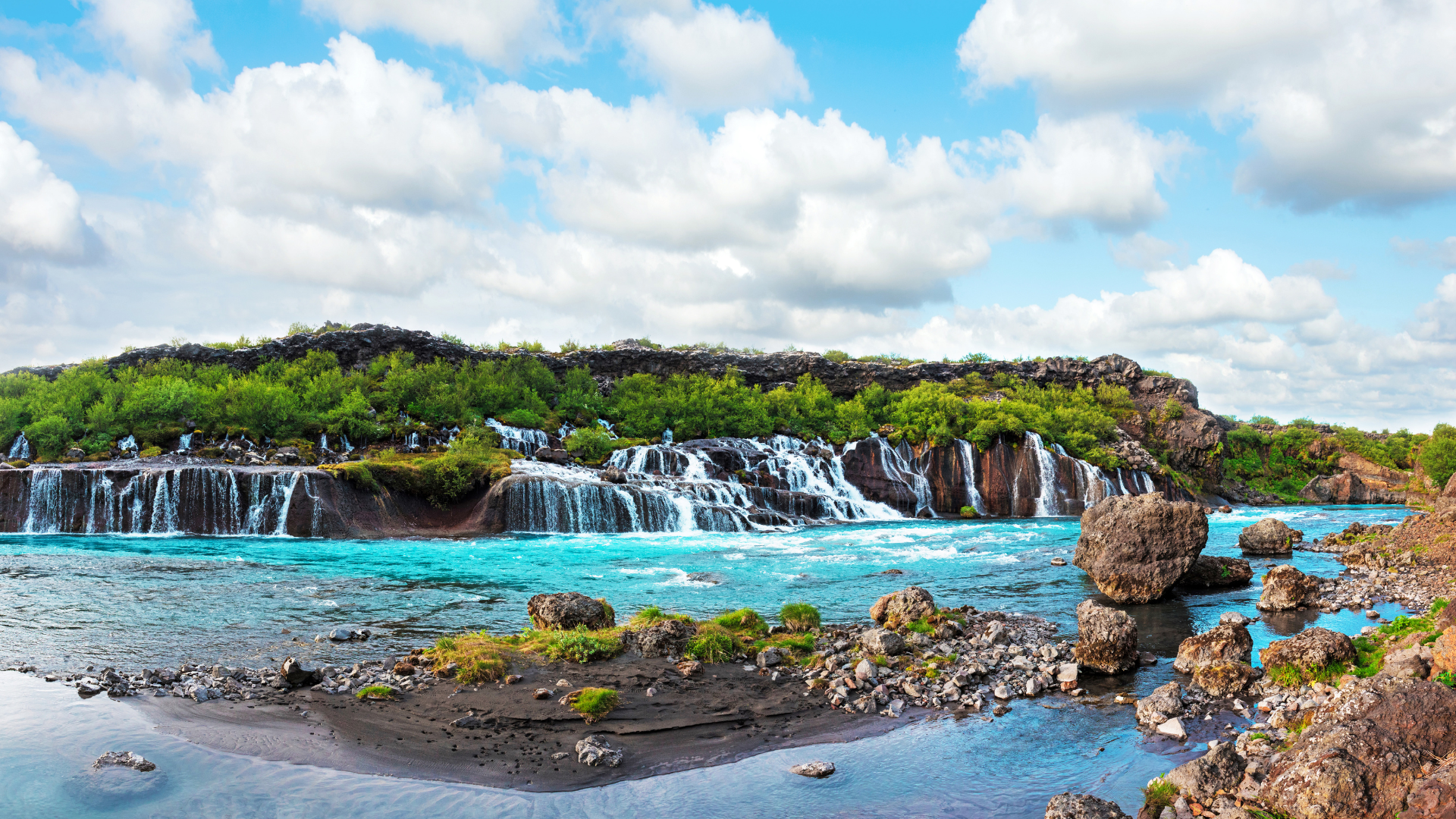 Hraunfossar waterfalls flowing from lava