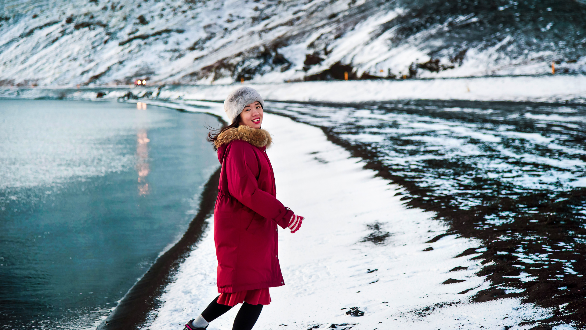 Guest walking beside Kleifarvatn lake in winter on the Reykjanes Peninsula