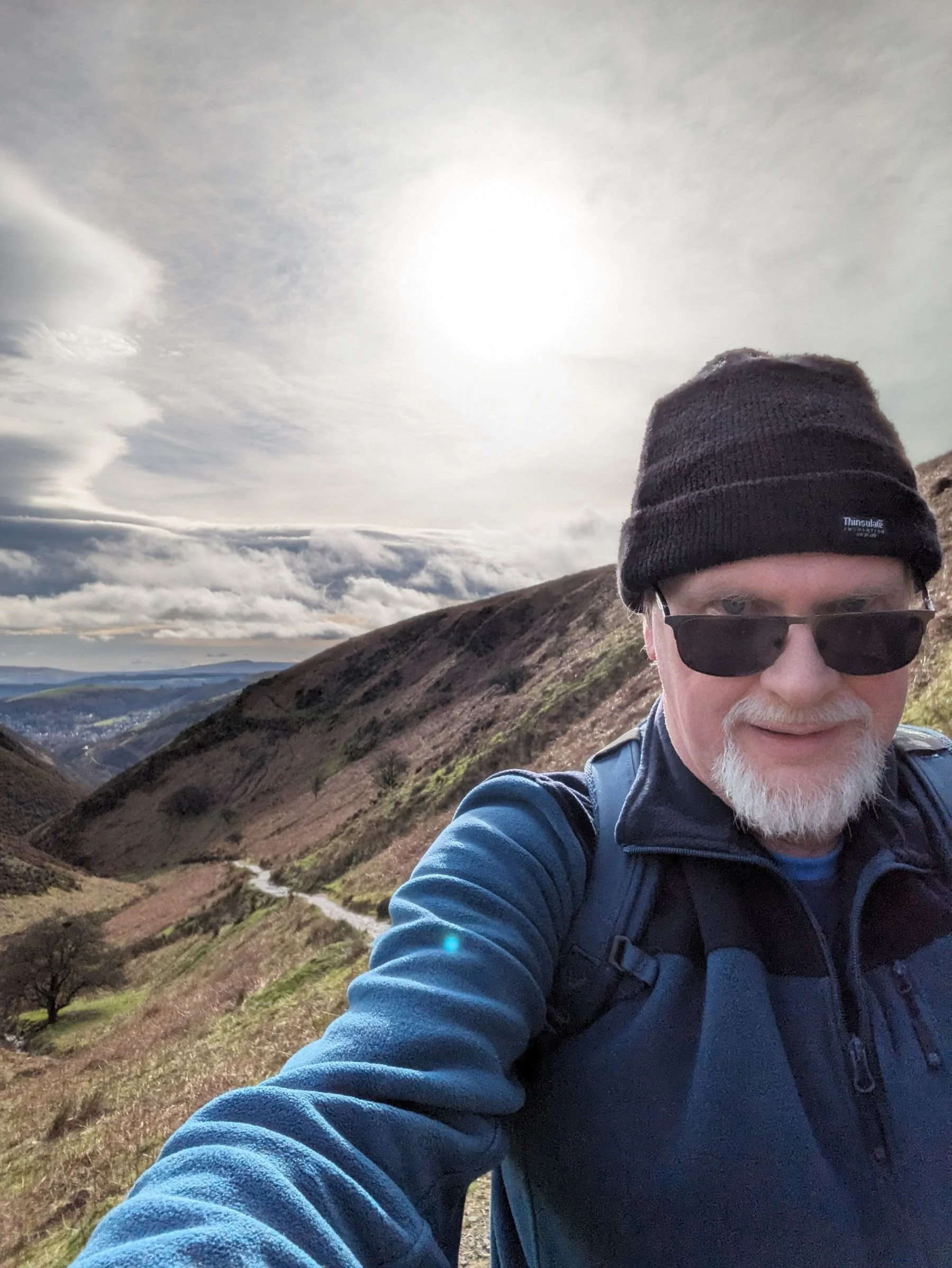 selfie of the artist halfway up a Shropshire hill