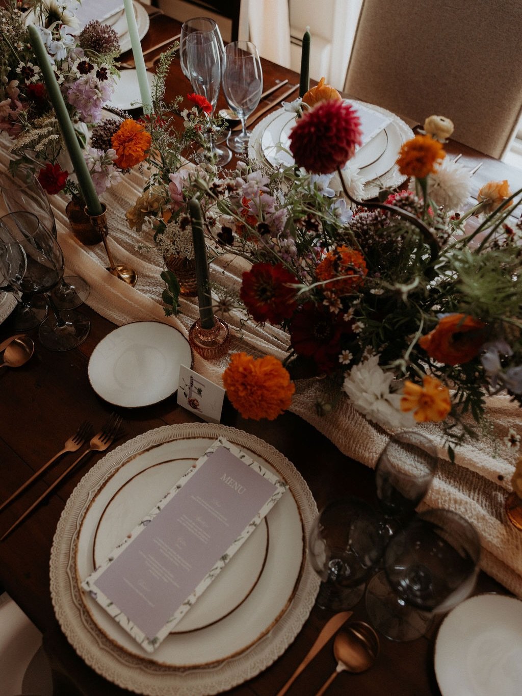 When I&rsquo;m designing a tablescape, I&rsquo;m considering everything:
&bull; color palette + tone
&bull; linen texture
&bull; floral height + movement
&bull; charger style
&bull; menu design
&bull; candle color + placement
&bull; glassware balance