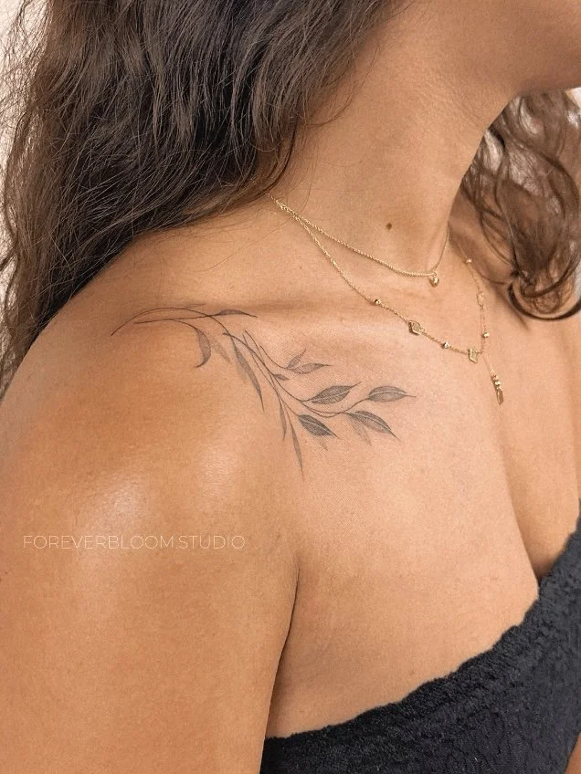small-collar-bone-vines-tattoo.jpg