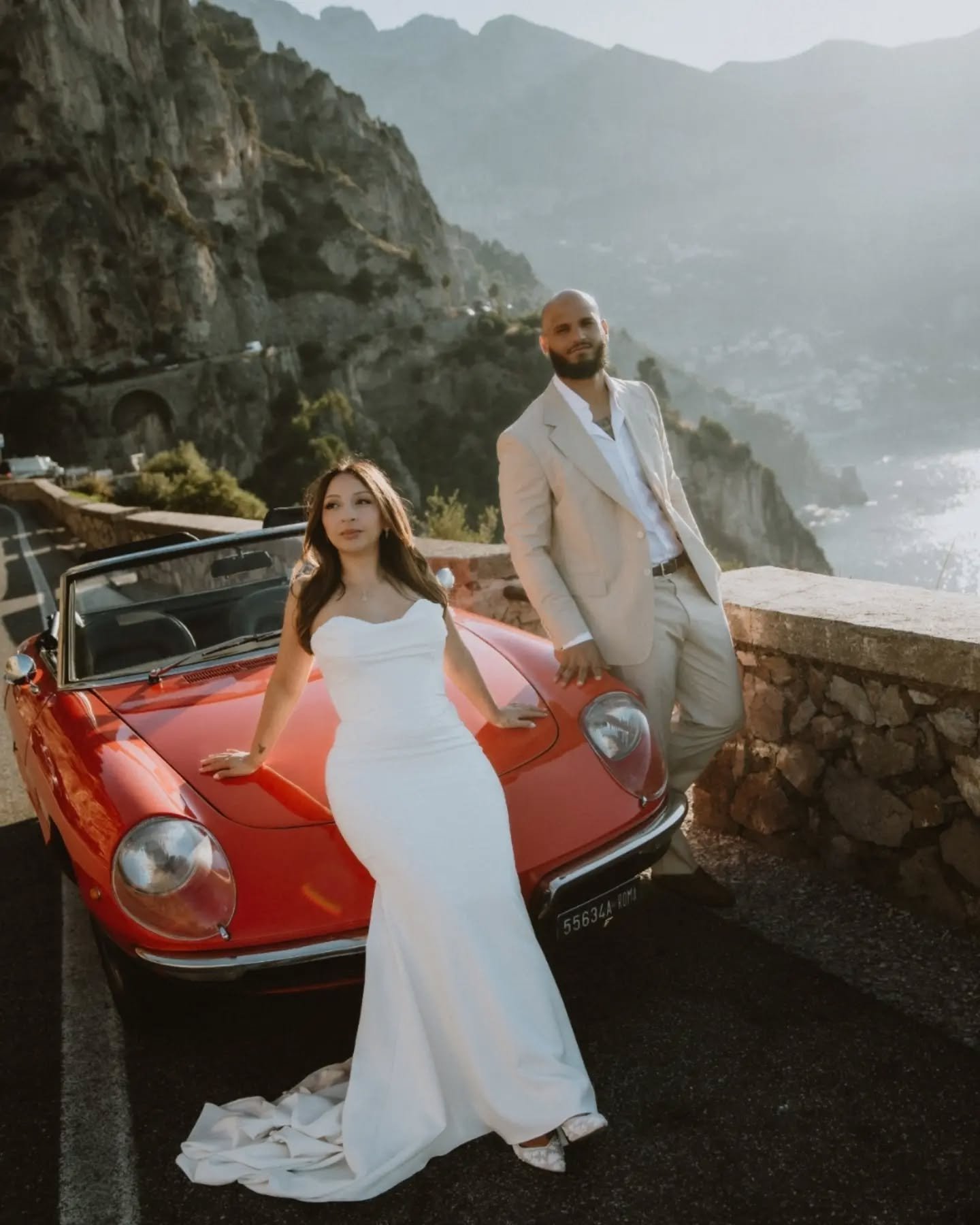 Karla &amp; Paco X Positano II One of the coolest sessions I've ever had. This is your sign to have a photoshoot with a vintage car at the Amalfi coast.  Breathtaking view, red vintage car= unforgettable experience. Forever grateful for being the par