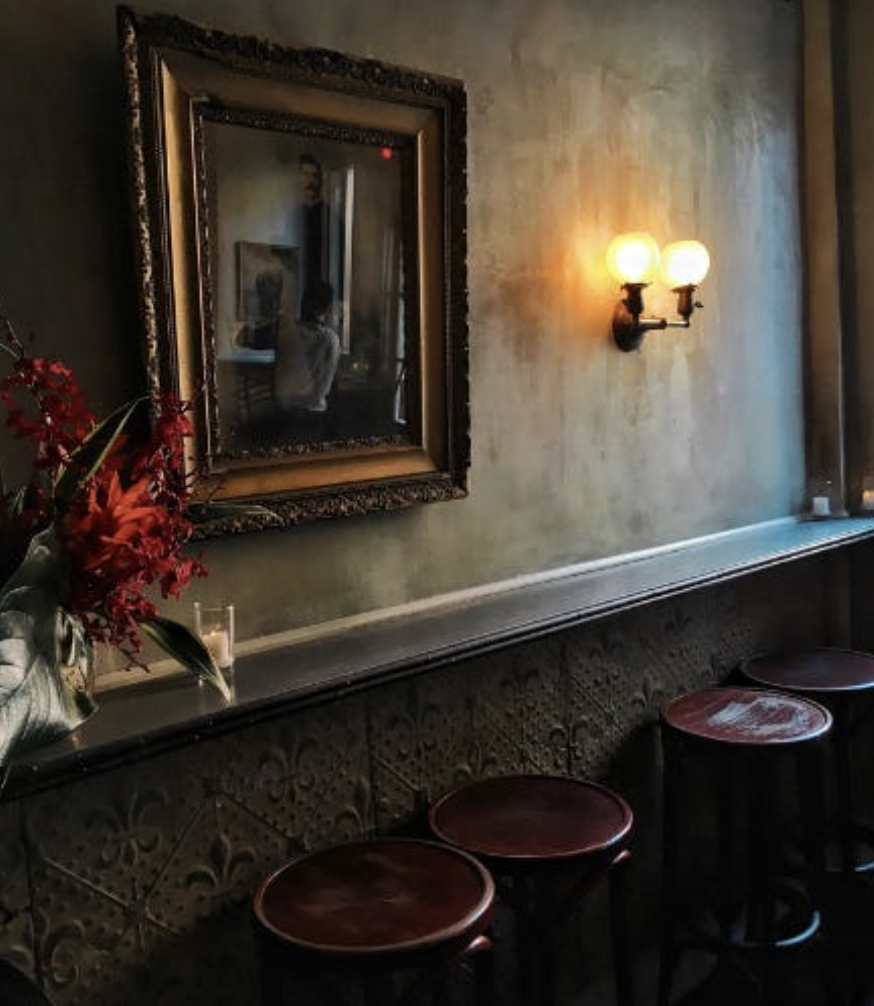 Custom decorative plaster walls throughout the dining room at Maison Premiere in Williamsburg, Brooklyn.