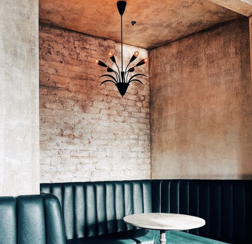 Custom distressed decorative wall finish created by Remont Studios for a wine bar in Brooklyn.