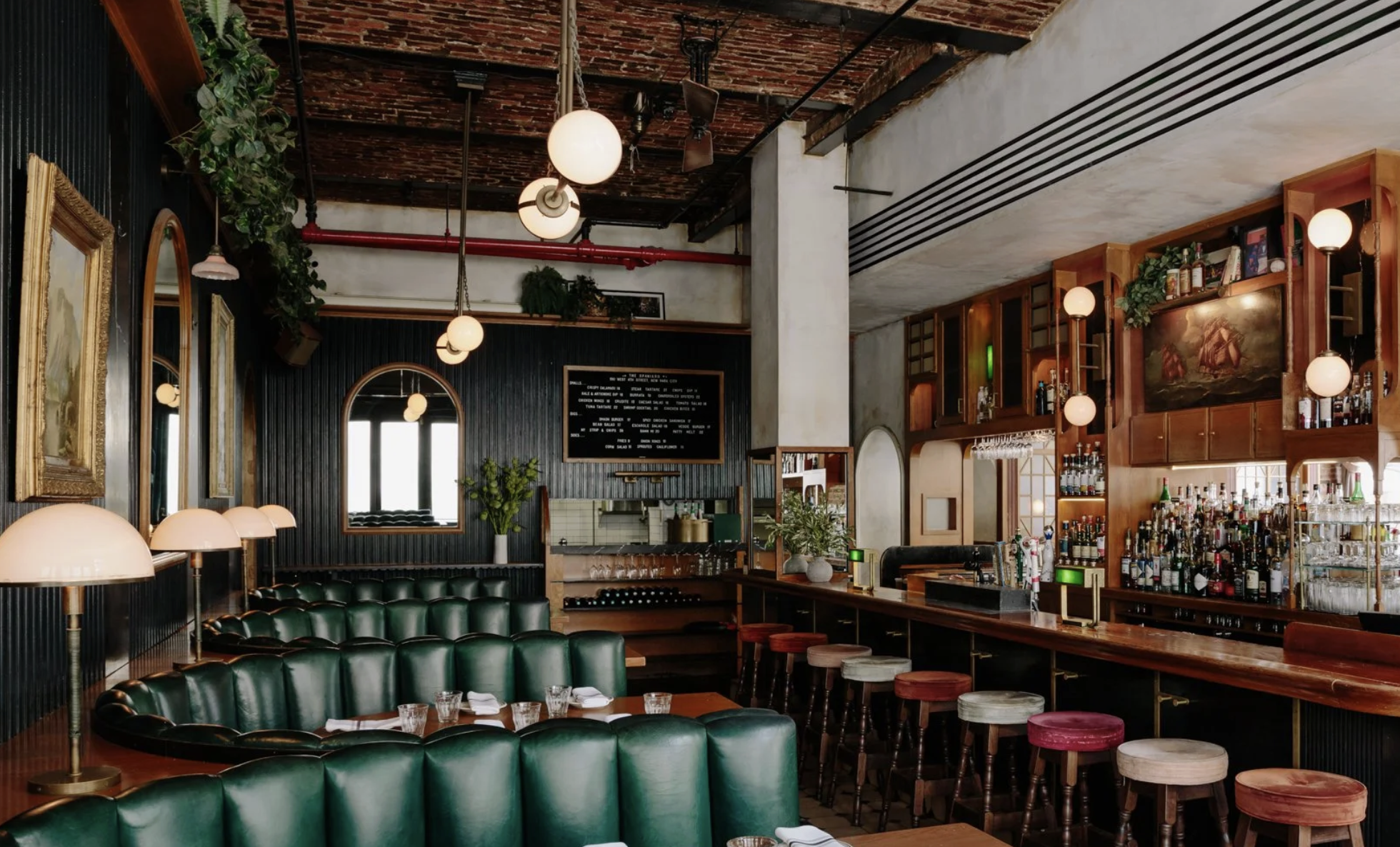 Custom distressed plaster walls throughout The Spaniard restaurant in New York City, finished by Remont Studios.