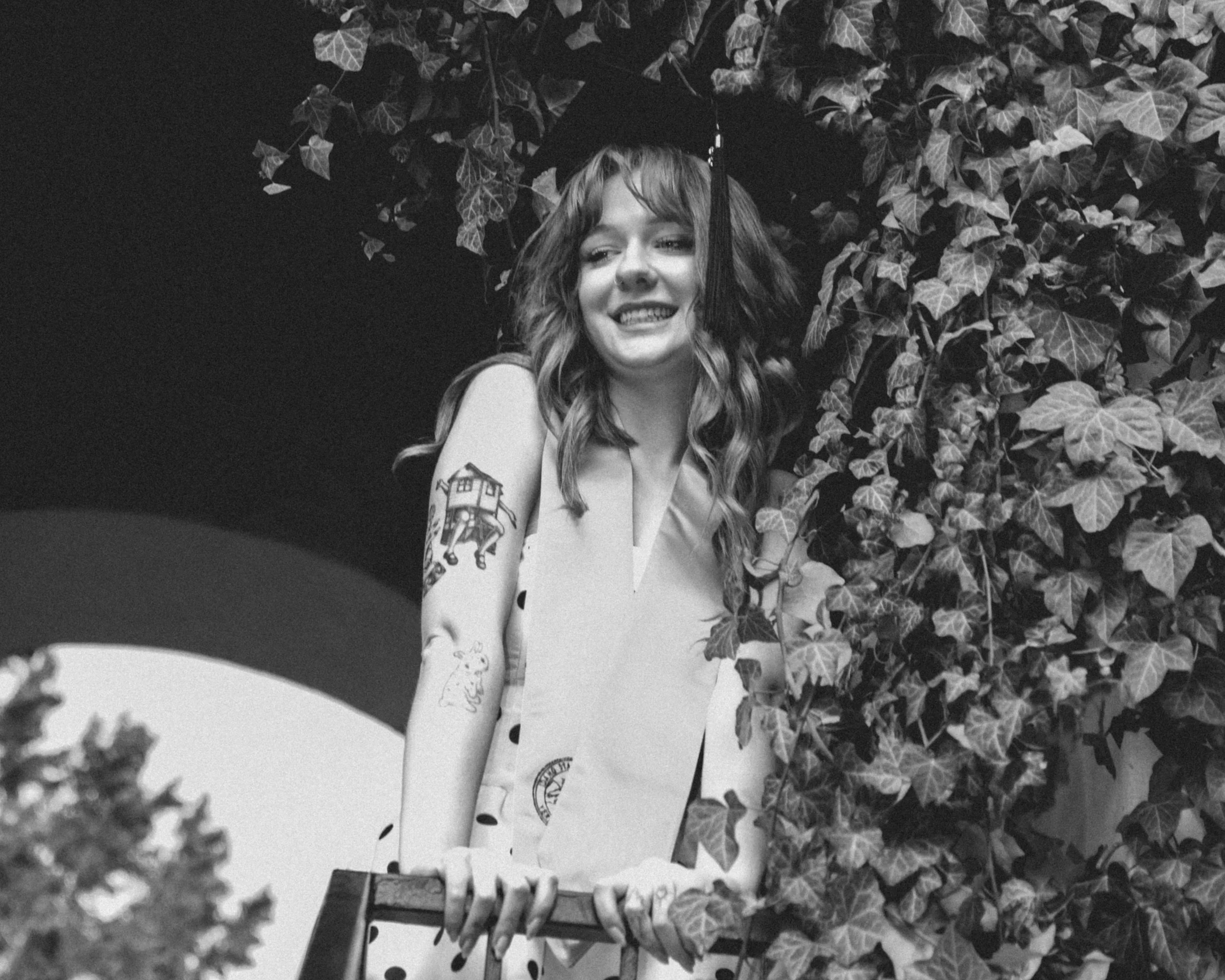 black and white photo of a women graduating