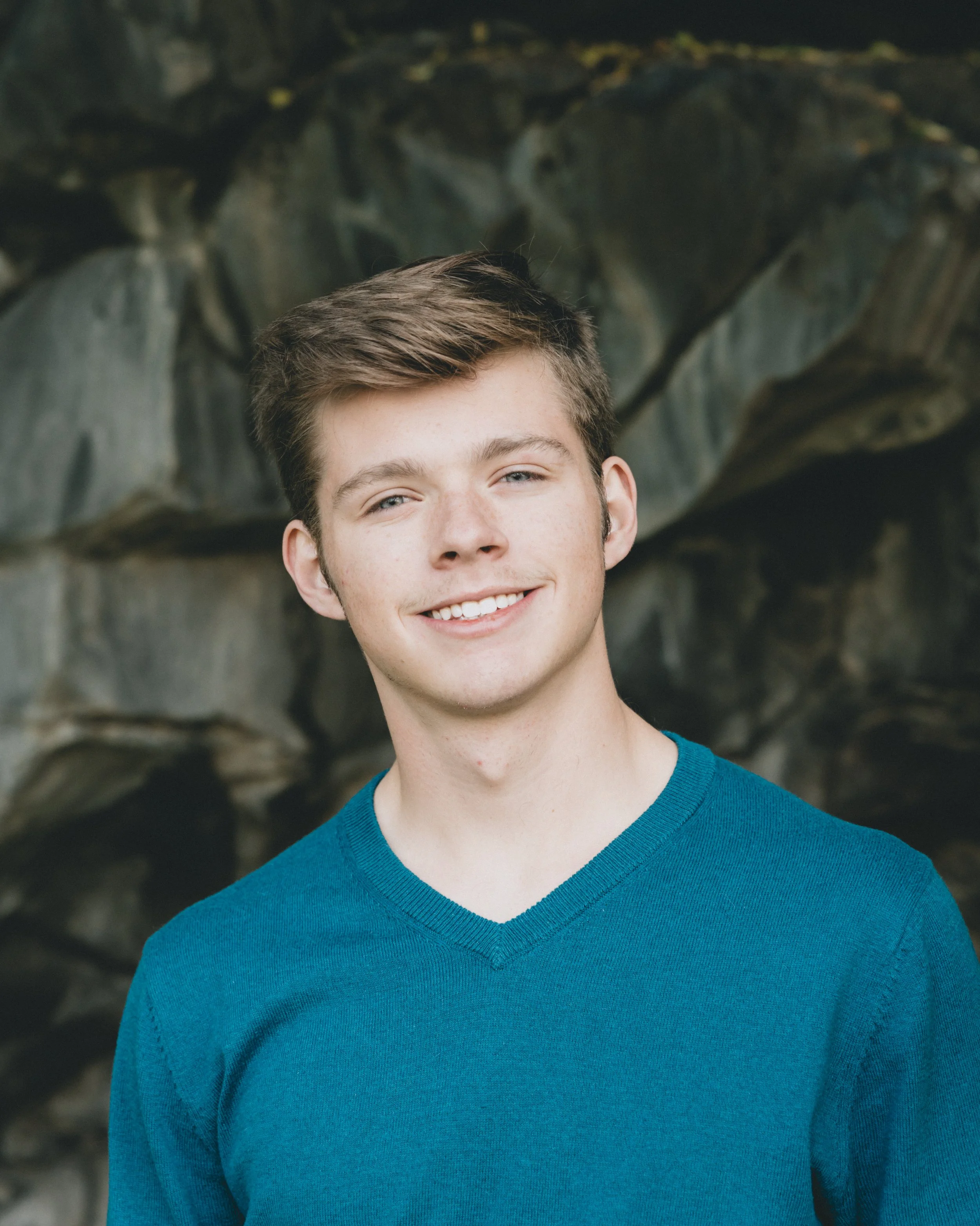 portrait of a graduation student at ross park in pocatello idaho taken by Campbell photography
