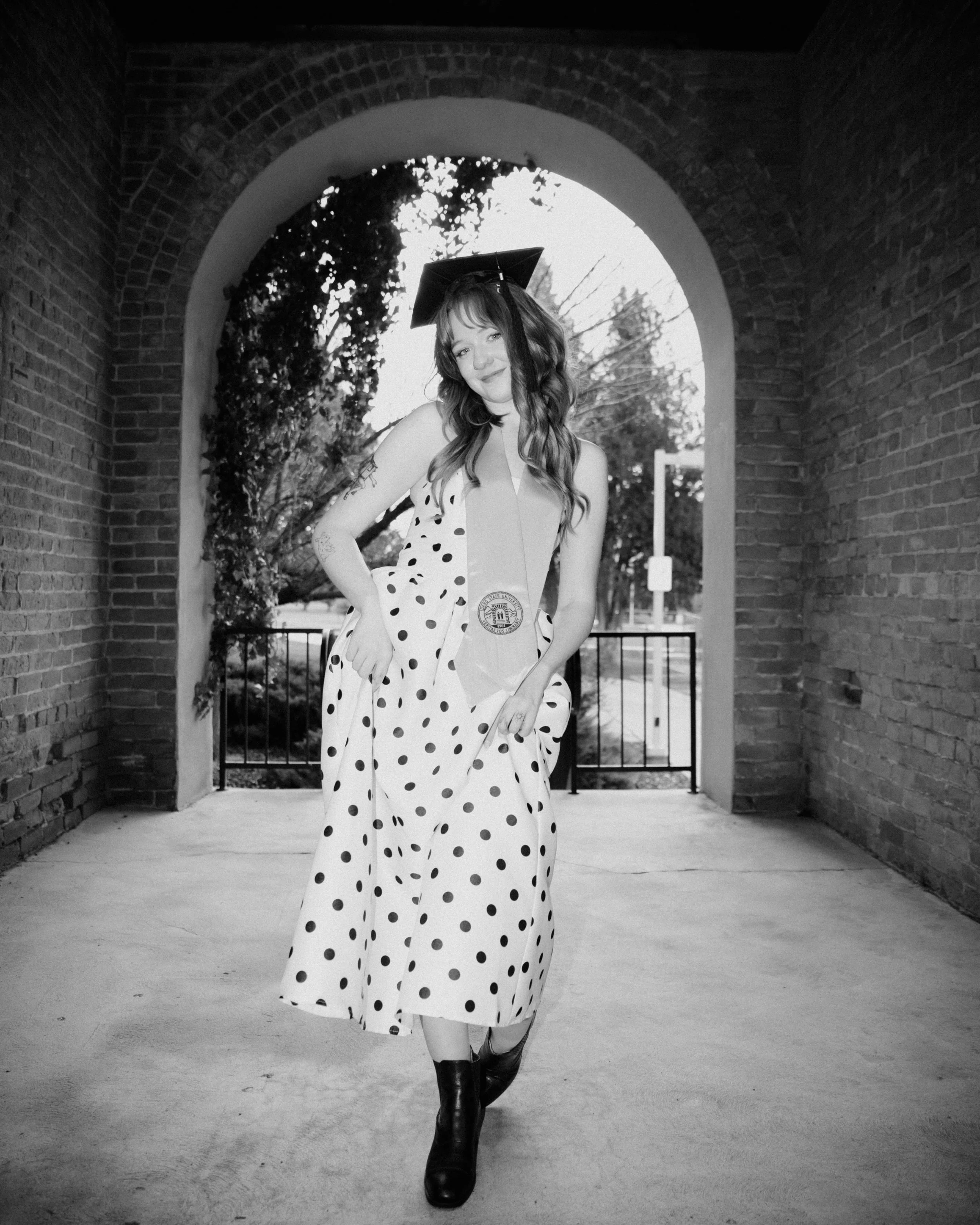 black and white picture of a women graduating college at idaho state university