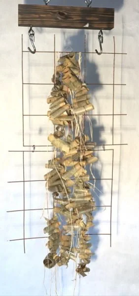 Melissa Rian, Red thread that Binds 1, 60” x 24” x 6”, encaustic, rebar, wire, wood, paper, 2020