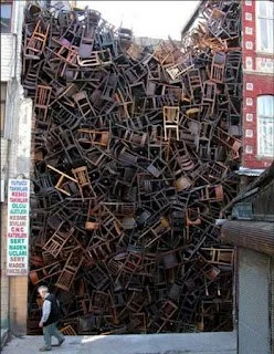 Doris Salcedo, “1550 Chairs Stacked Between Two City Buildings” Istanbul Biennial, 2003