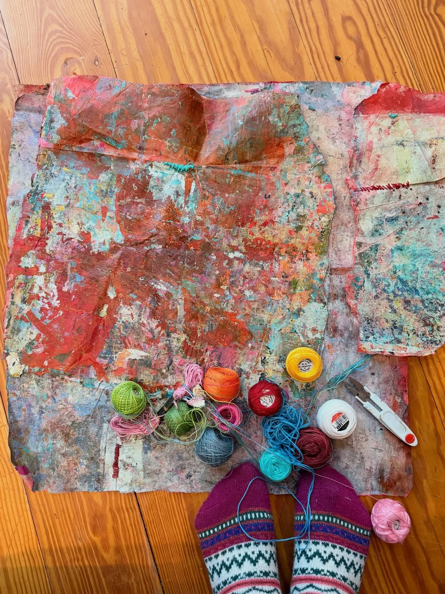 Some days the studio is just this &mdash;
painted scraps, thread, worn edges,
and the slow work of figuring it out
one stitch at a time.

#abstractart #contemporaryart #mixedmedia #collage #artinprocess