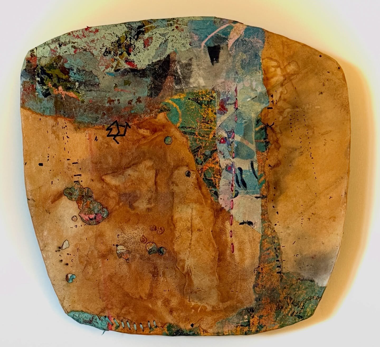 A narrow passage runs through it&mdash;
part seam, part rupture&mdash;holding two conditions at once.

I&rsquo;m interested in that space where something splits,
but doesn&rsquo;t fully separate 

13x12 acrylic, thread, paper, smoke on cardboard moun