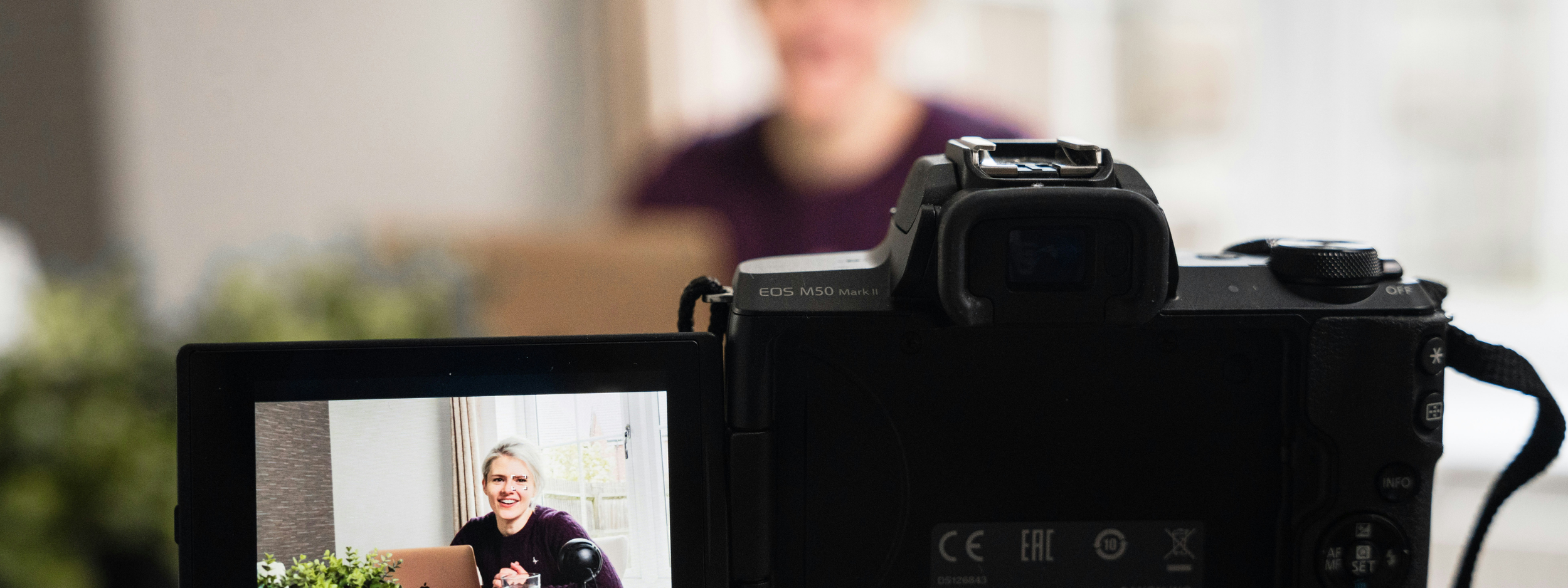 Professional confidently presenting meaningful work to an audience.