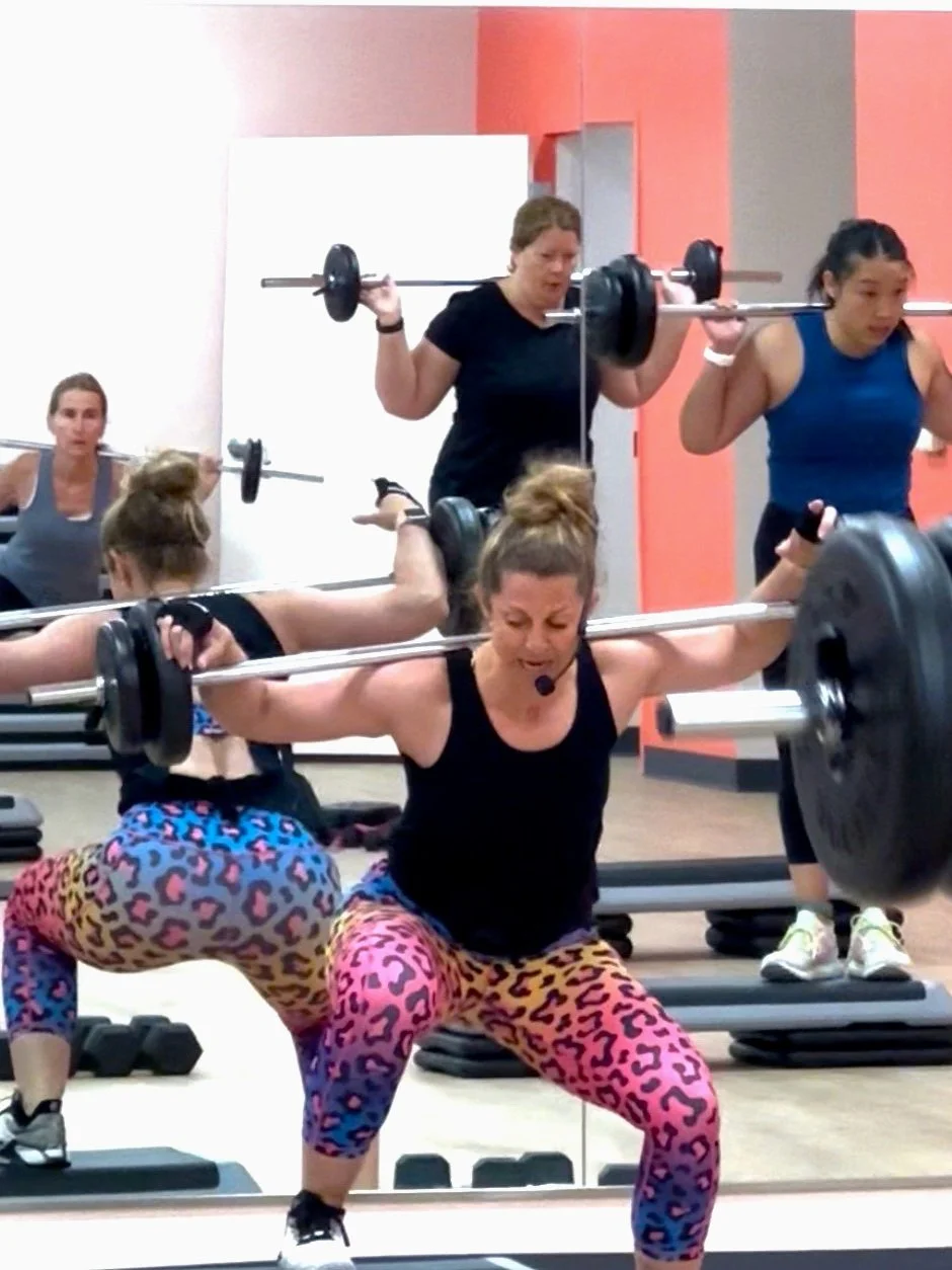 Women Working Out Dumbbells