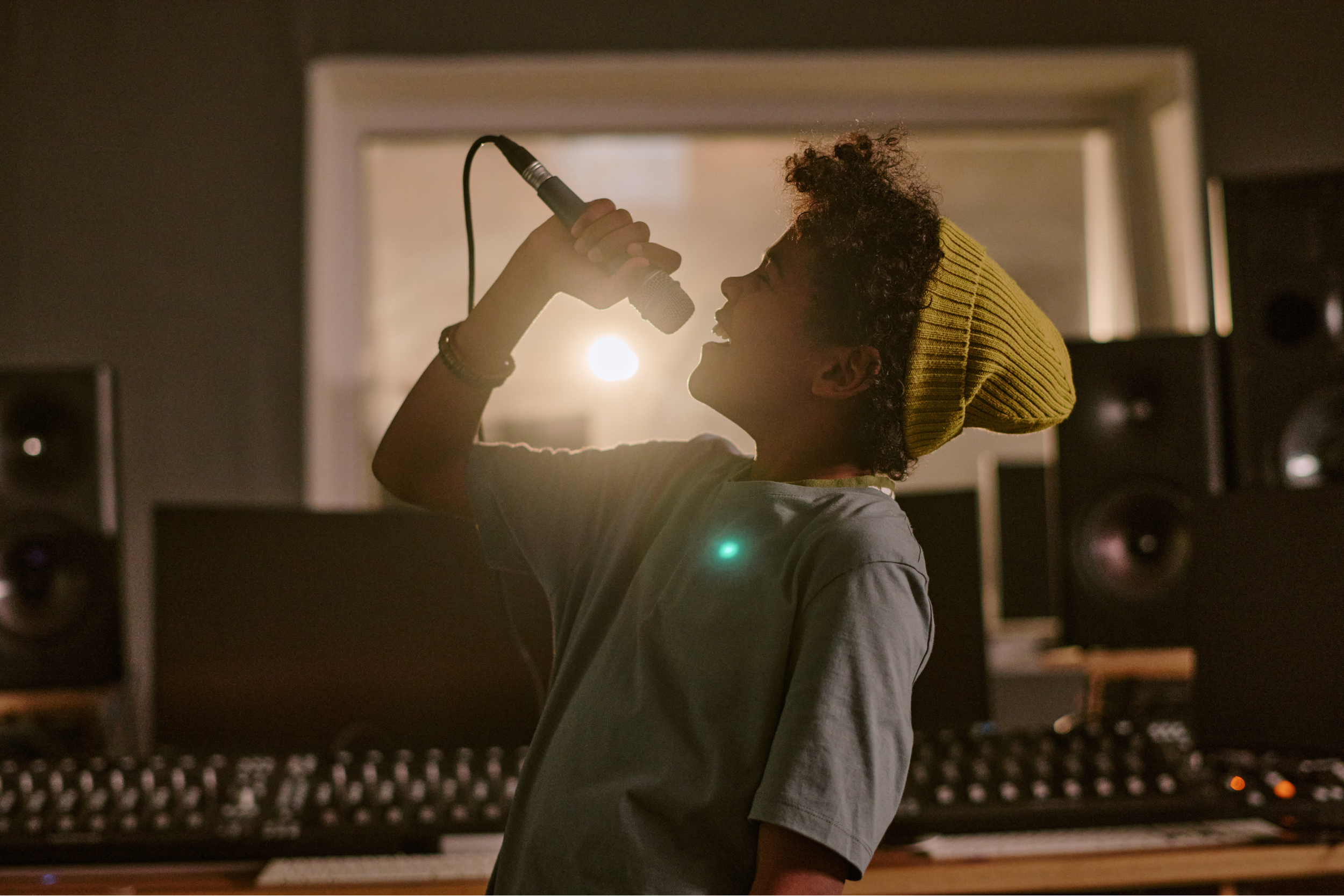 teen boy singing happy