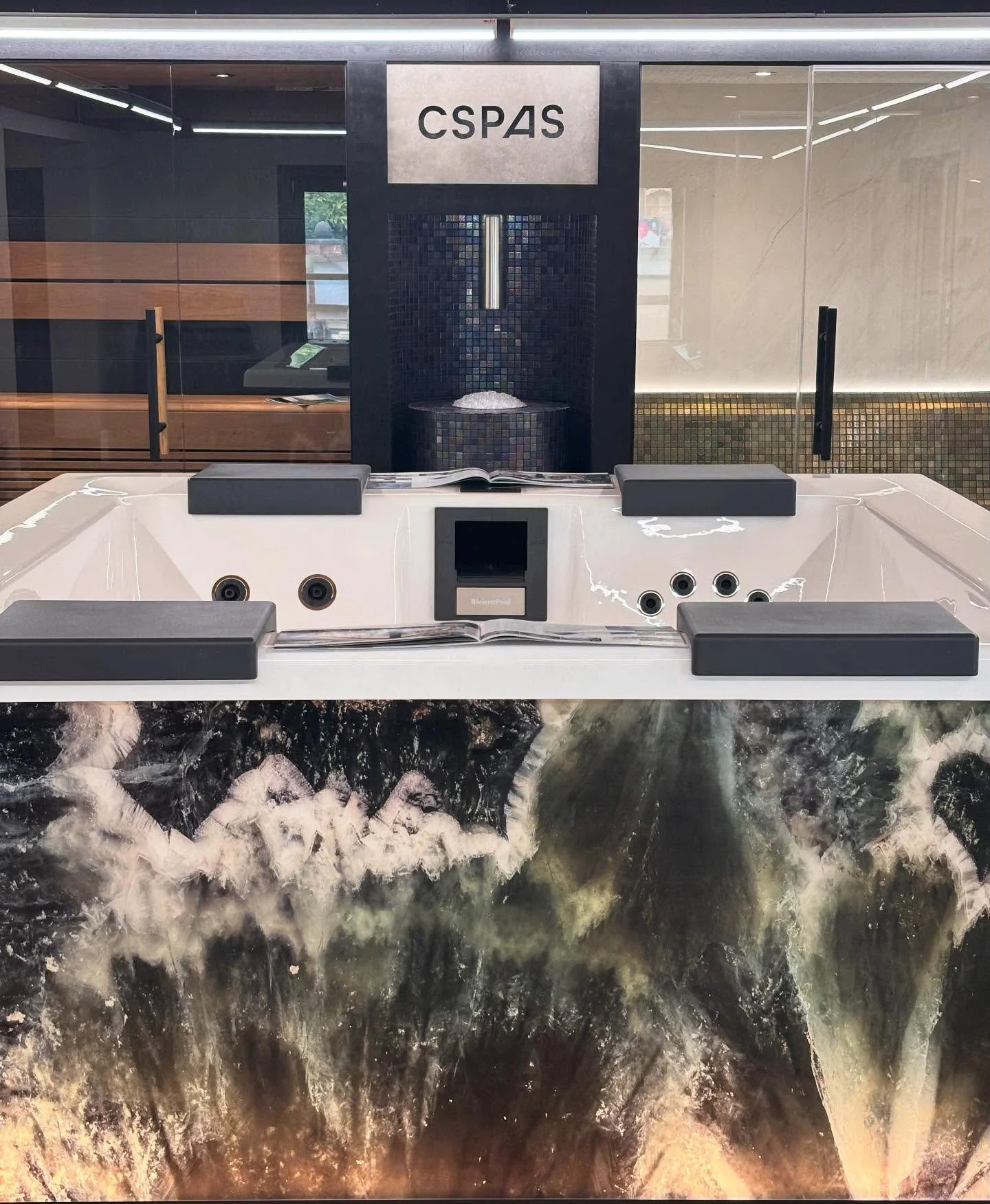 On display in our High Legh showroom, the RivieraPool STRATO VETRITE - Spa pool meets art object. 
An individual combination of glass and spa design. The modern Strato RivieraPool features the new and exclusive illuminated Vetrite glass collection f