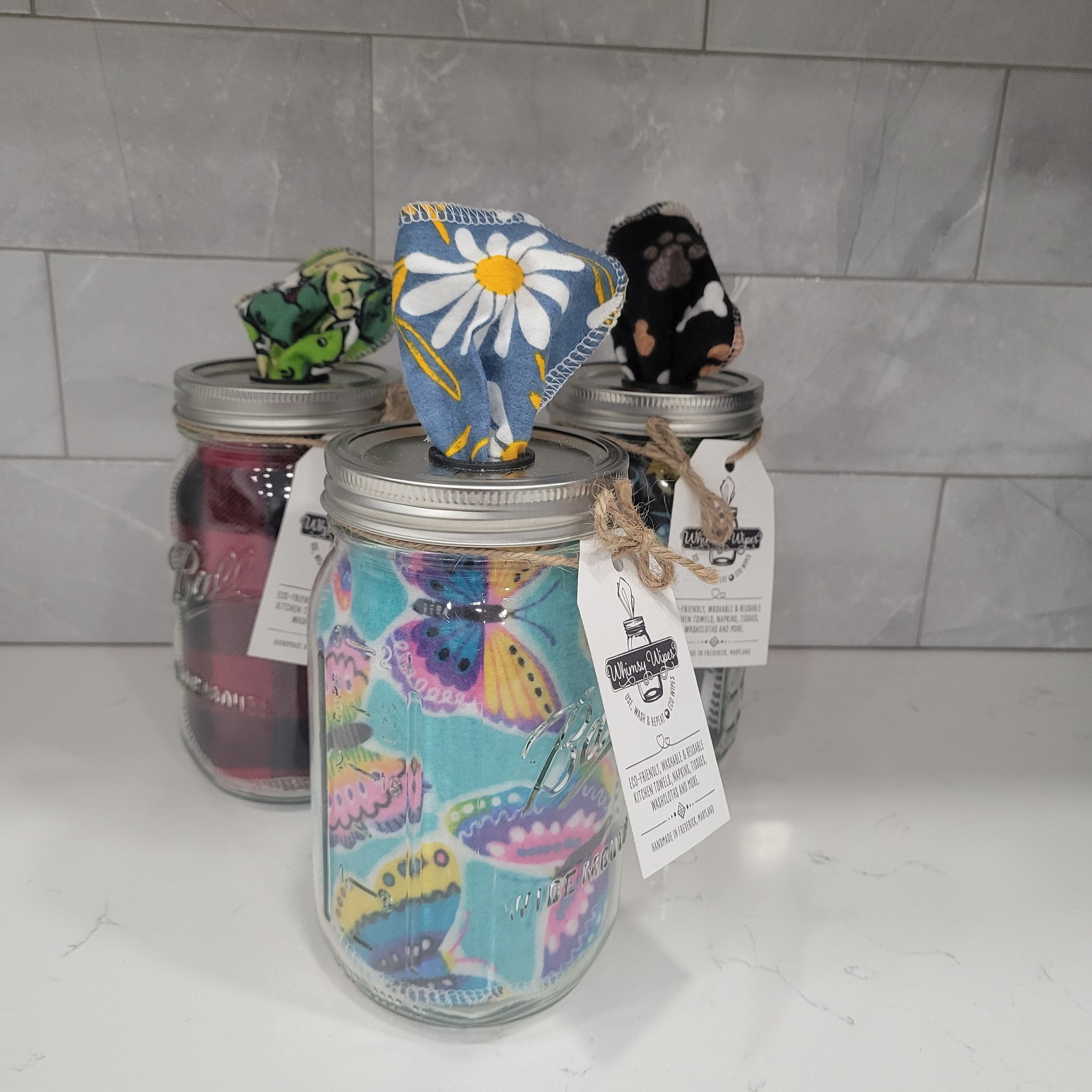 Three quart jars with whimsy wipes tissues