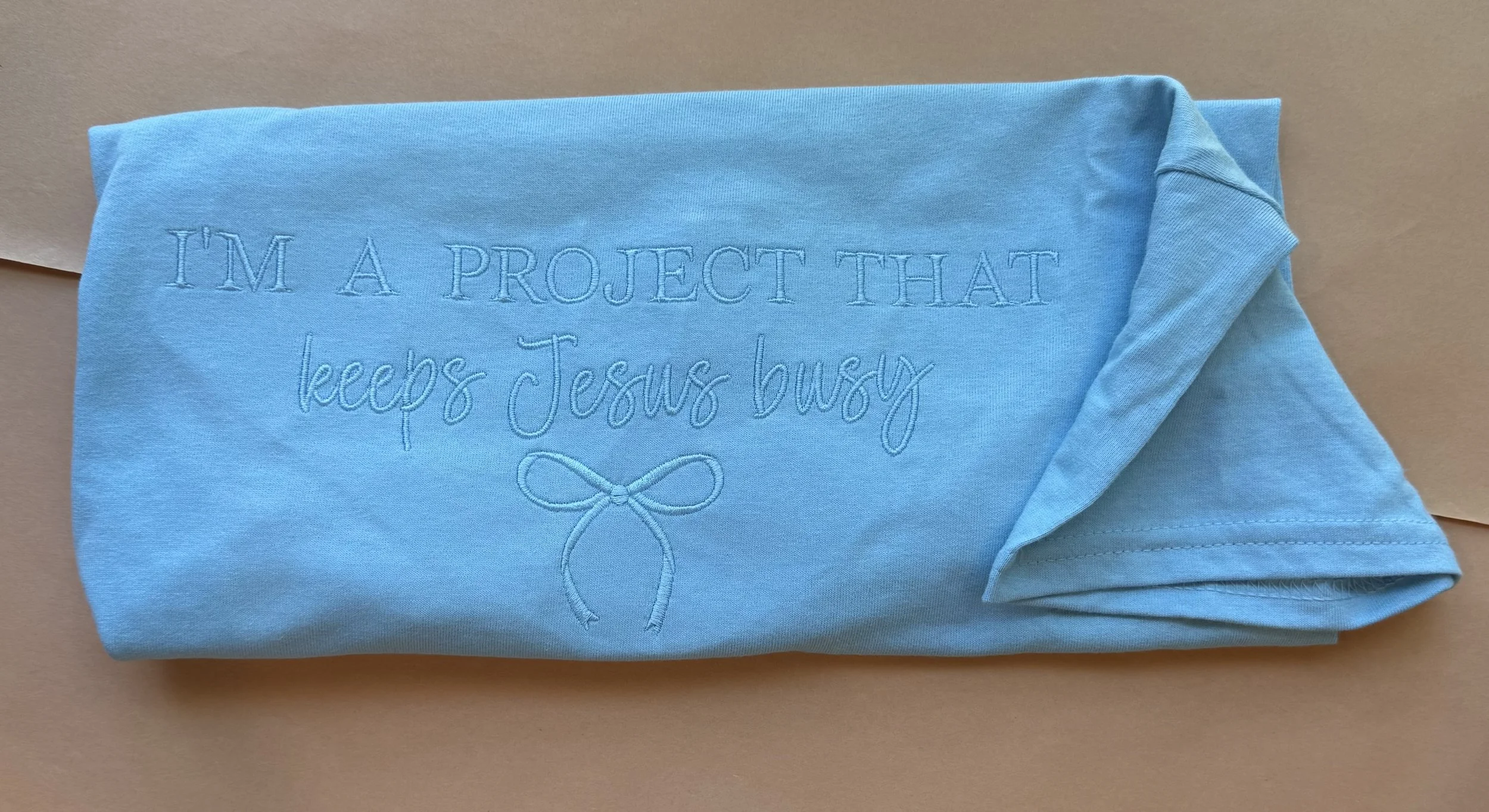 I’m A Project That Keeps Jesus Busy Tshirt