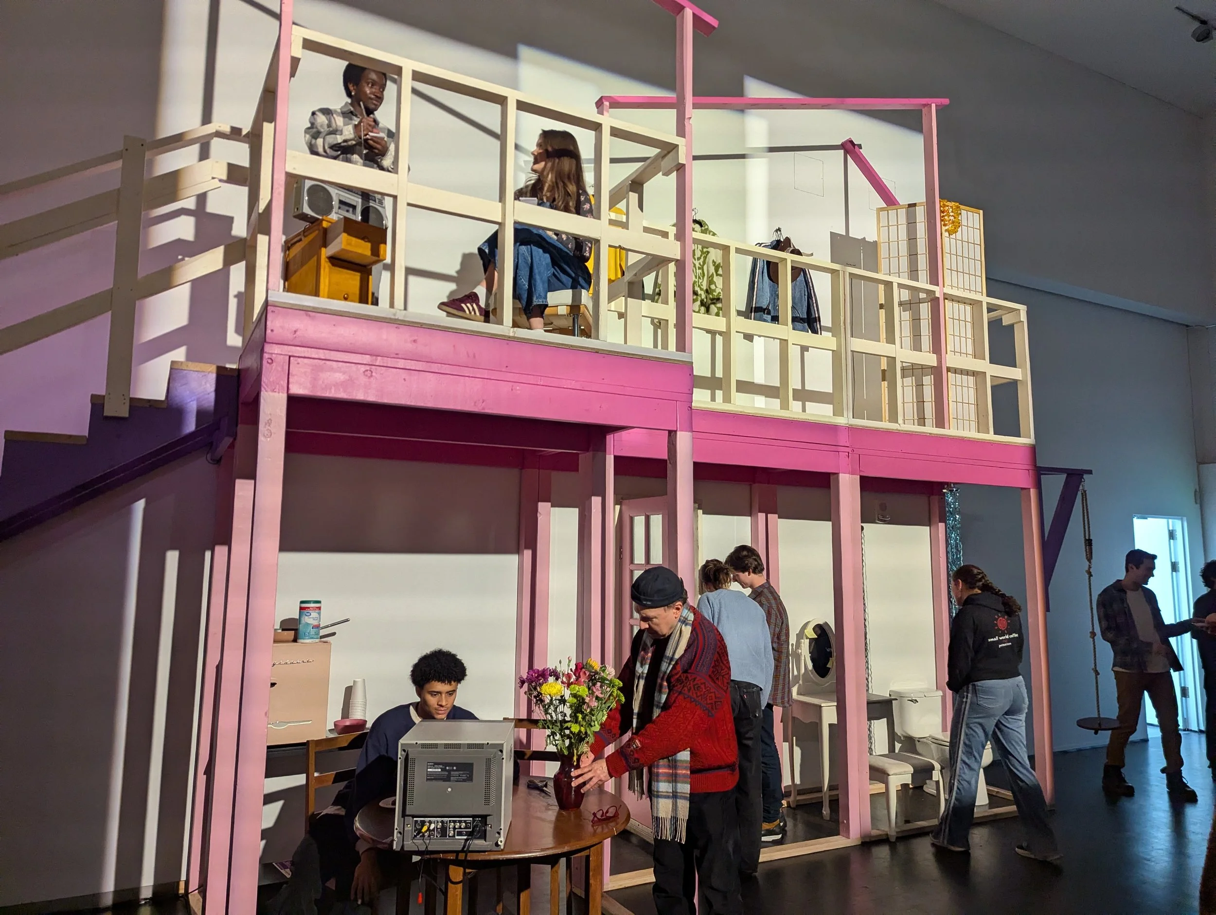 Barbies living in their home together