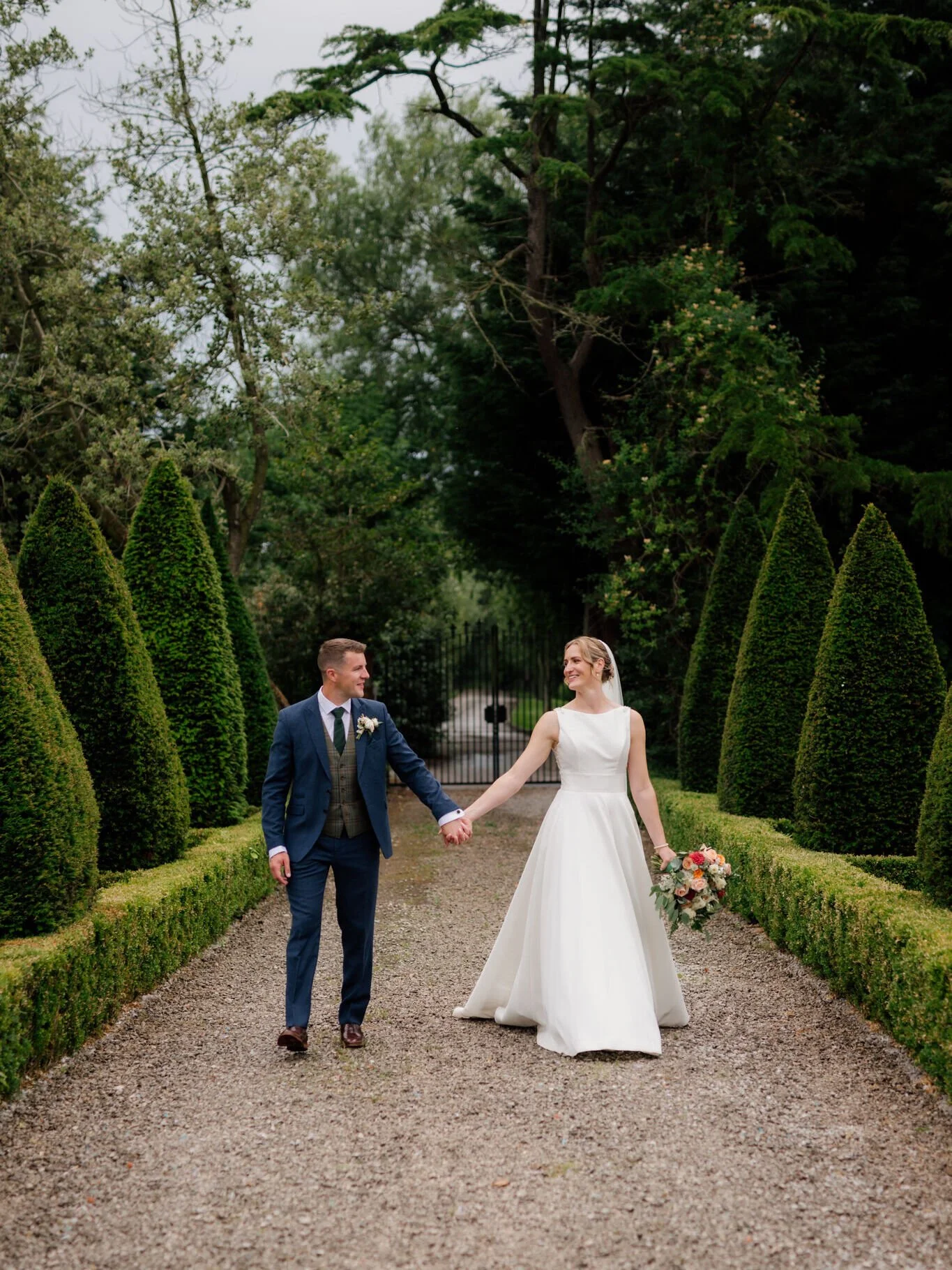 Maisie and Henry strollin' through the grounds of The River Barn during their rainy, romantic wedding day 🍃 ❤️ 

Photographer: @laurabarehamphotography
Venue: @riverbarnweddings
Suit: @jakesandco
Dress: @bridallancaster
Hairpiece: @edenbstudio
Makeu