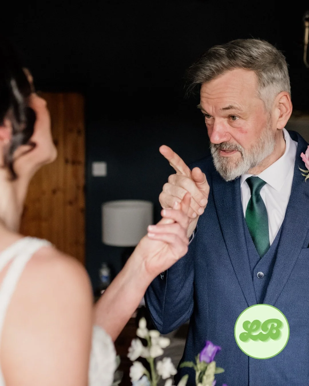 The story behind this photo, because this is one of those frames that makes me laugh and also tear up a little bit every single time it pops up on my screen.

This is Vicki and her dad a few minutes before the ceremony. He'd just seen Vicki in her dr