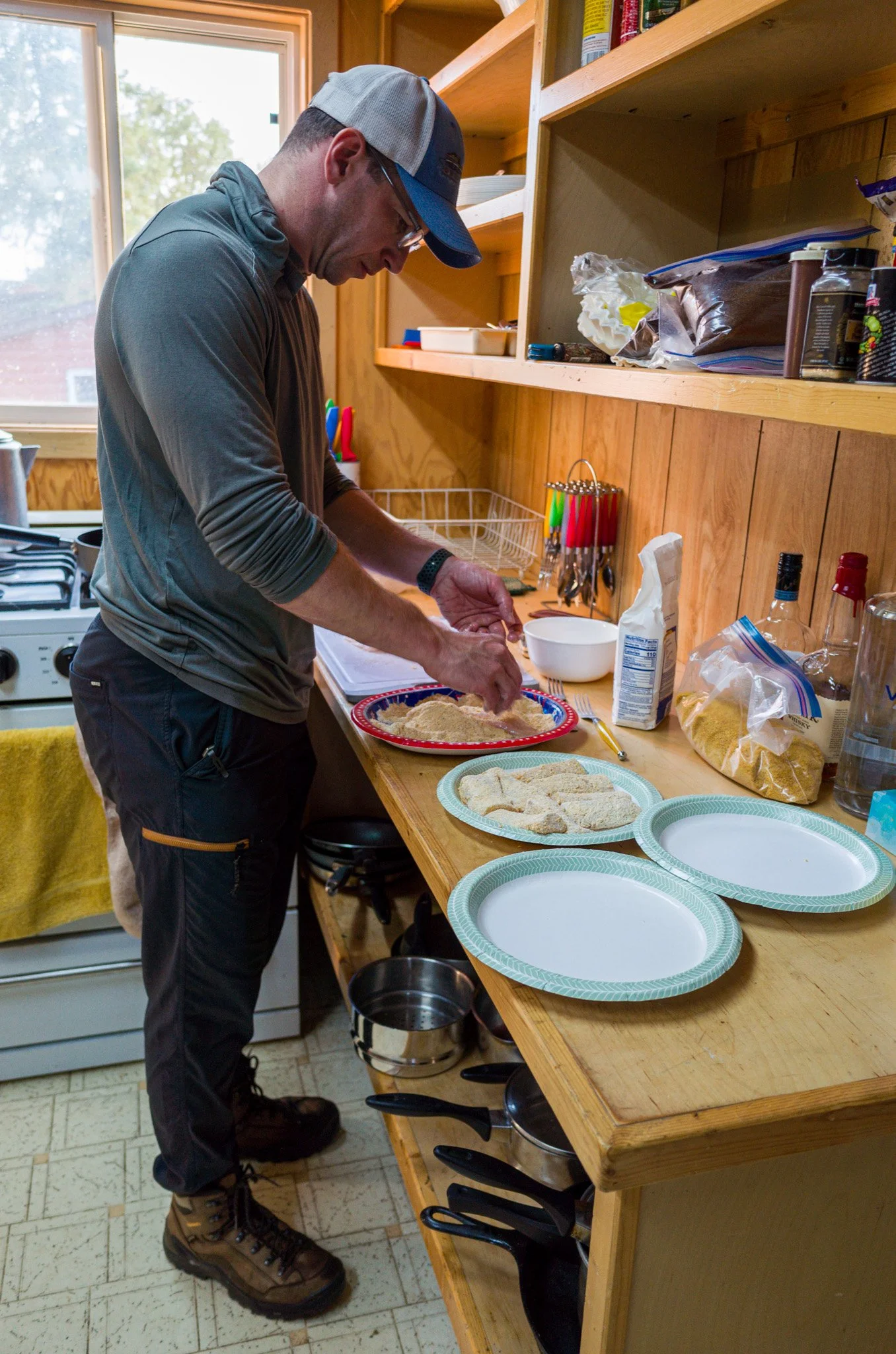 Scott preparing the fish for dinner
