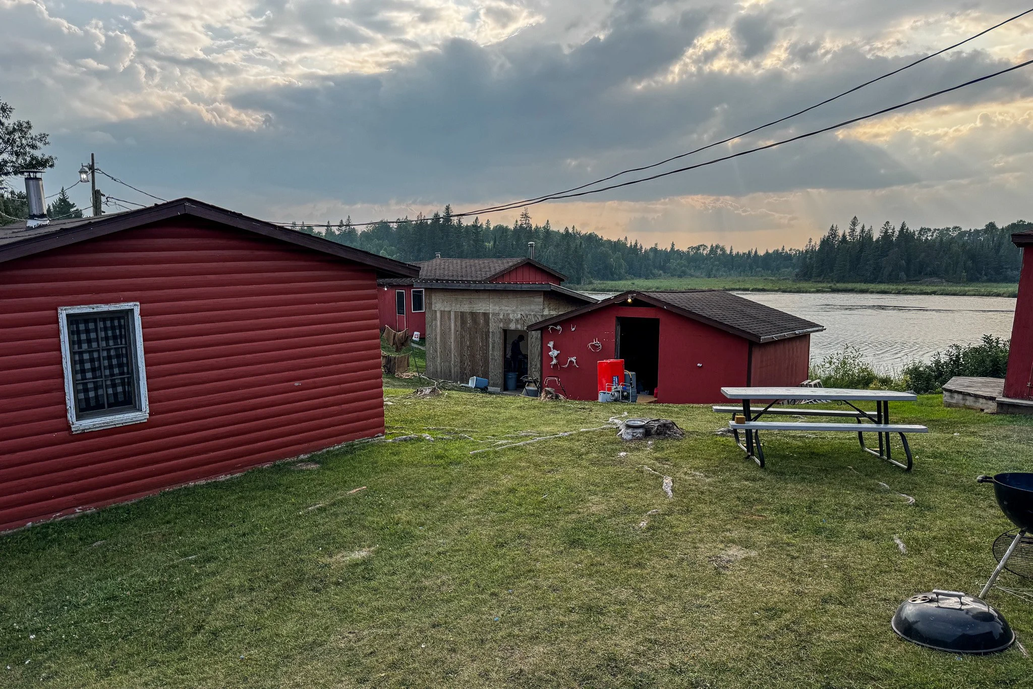 Jordan cleaning our fish in the fish house