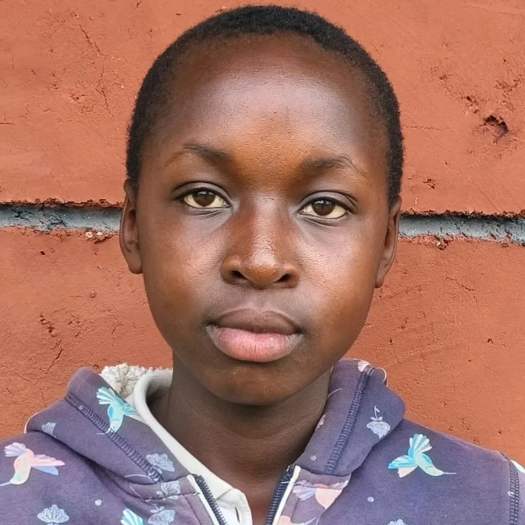 Meet Philes Nyaribo:

Philes is a bright and thoughtful 14-year-old in 9th grade at Nyandoche Ibere Elementary School. As the third born in a family of four, she looks up to her siblings while also stepping into her own strengths. Philes is committed