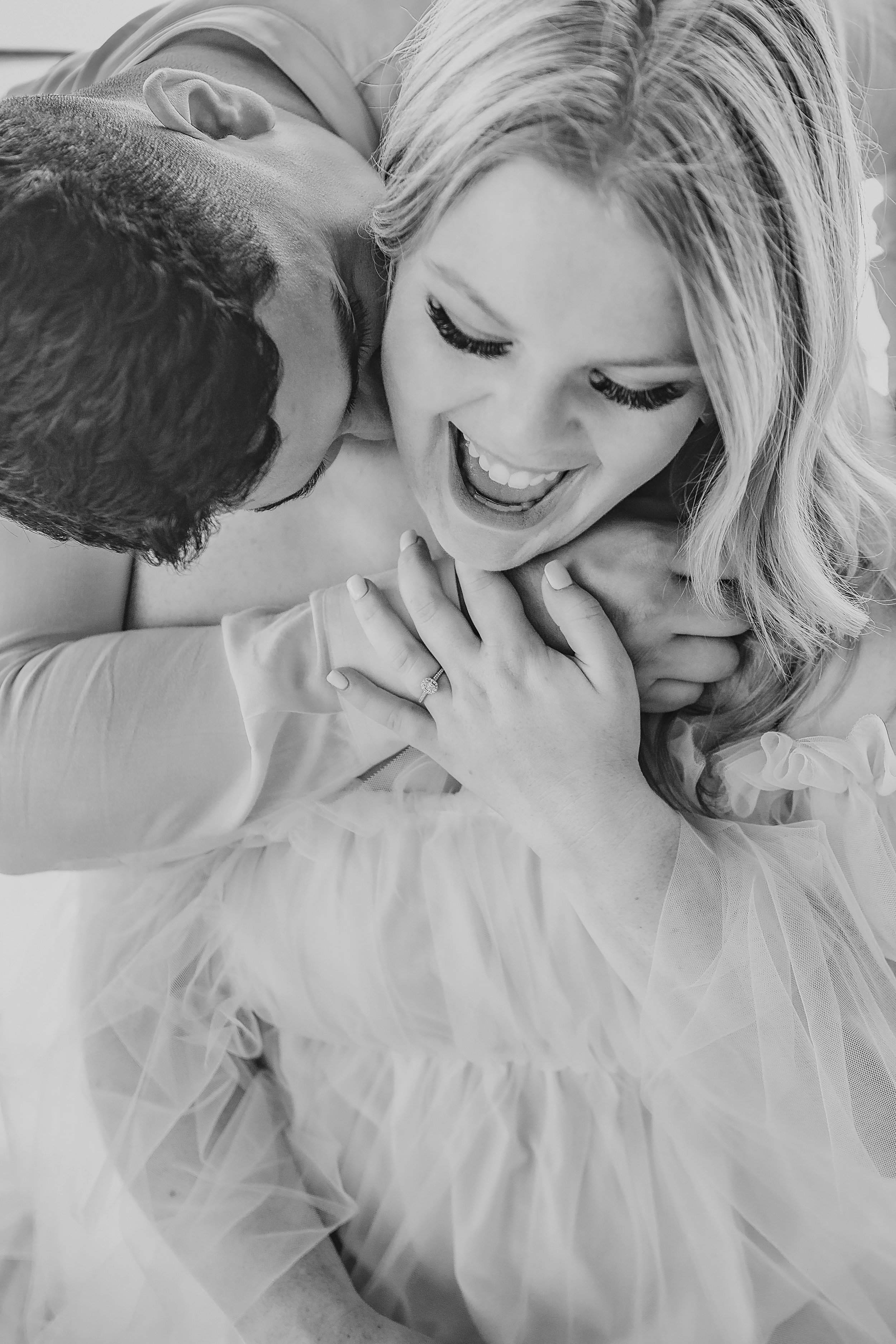 Joyful and affectionate engagement session with candid photo vibes.