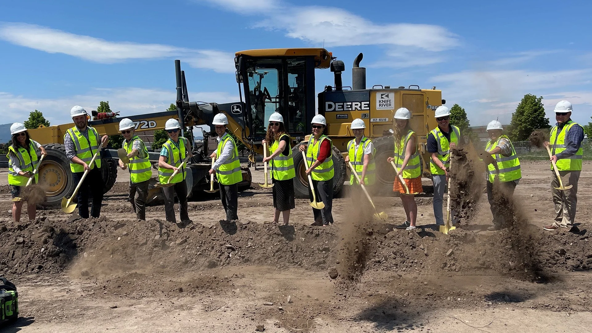 Homeword board and staff at Trinity groundbreaking ceremony